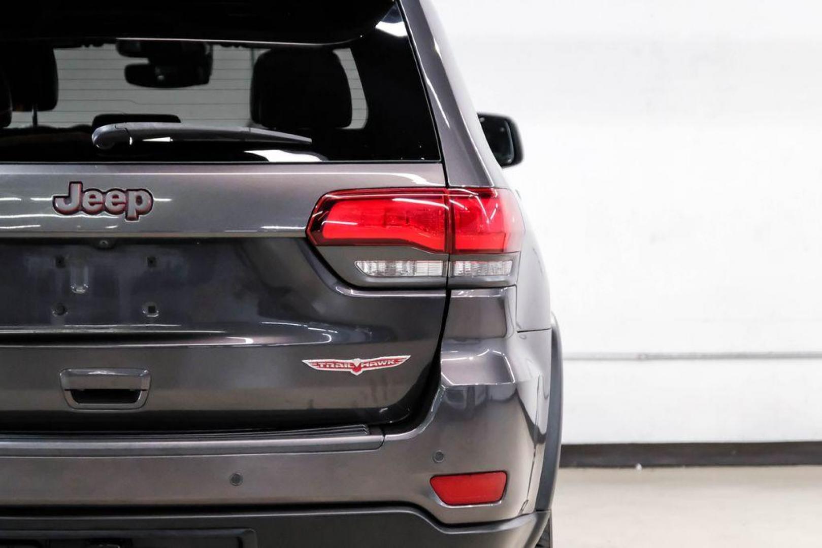 2019 Granite Crystal Metallic Clearcoat /Black Jeep Grand Cherokee Trailhawk (1C4RJFLT3KC) with an 5.7L V8 HEMI engine, Automatic transmission, located at 15300 Midway Rd., Addison, TX, 75001, (972) 702-0011, 32.958321, -96.838074 - Photo#57