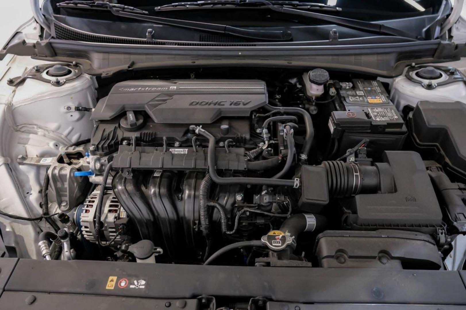 2025 Snow White Pearl /RED Kia K4 GT-Line (3KPFW4DE6SE) with an 2.0L I4 MPI engine, CVT transmission, located at 15300 Midway Rd., Addison, TX, 75001, (972) 702-0011, 32.958321, -96.838074 - Photo#53
