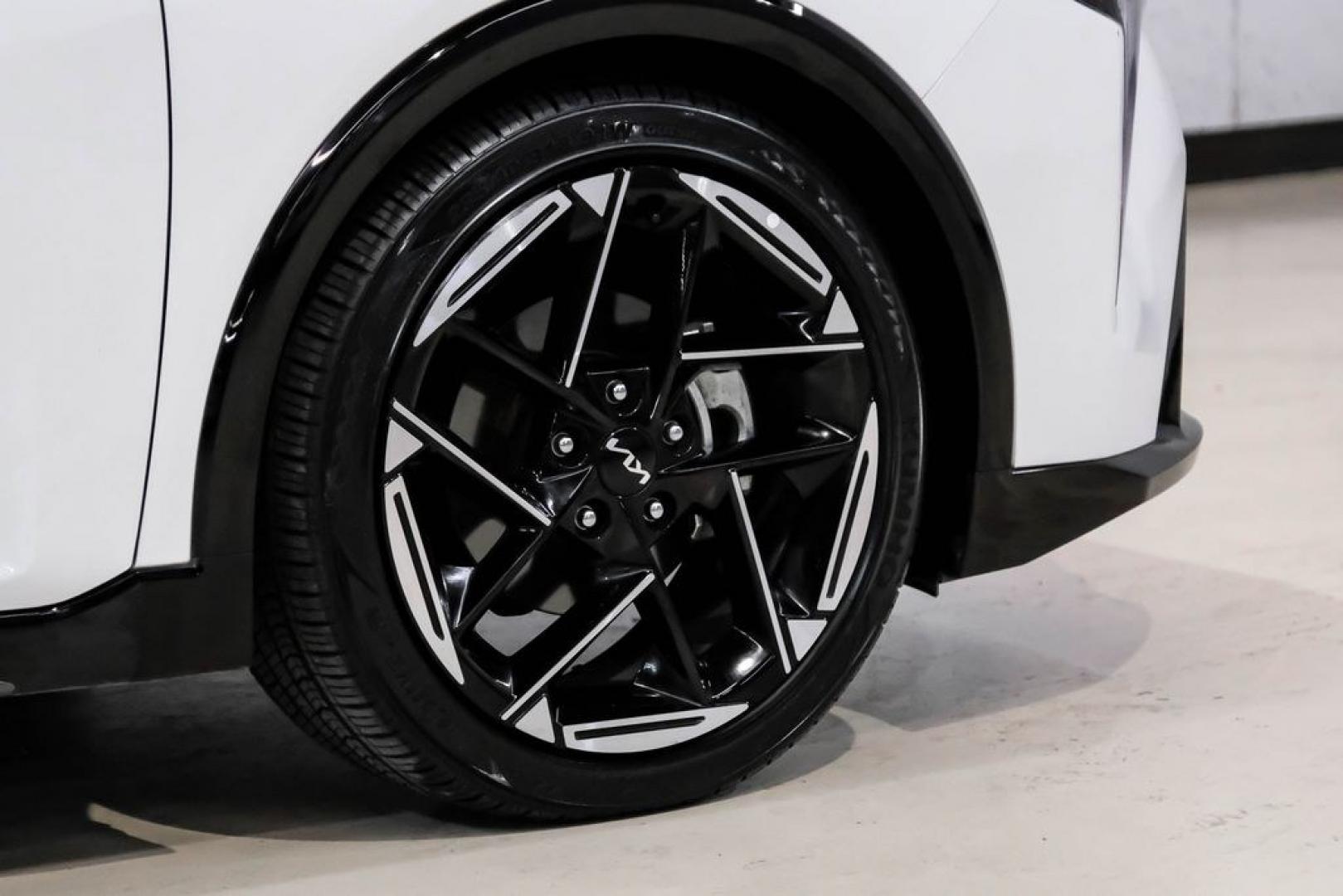 2025 Snow White Pearl /RED Kia K4 GT-Line (3KPFW4DE6SE) with an 2.0L I4 MPI engine, CVT transmission, located at 15300 Midway Rd., Addison, TX, 75001, (972) 702-0011, 32.958321, -96.838074 - Photo#57