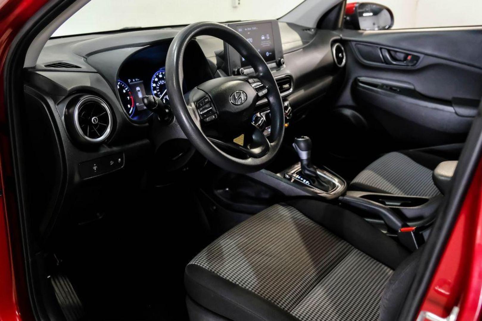 2023 Red /Black Hyundai Kona SE (KM8K22AB3PU) with an 2.0L I4 DOHC Dual CVVT engine, CVT transmission, located at 15300 Midway Rd., Addison, TX, 75001, (972) 702-0011, 32.958321, -96.838074 - Photo#2