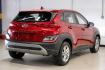 2023 Red /Black Hyundai Kona SE (KM8K22AB3PU) with an 2.0L I4 DOHC Dual CVVT engine, CVT transmission, located at 15300 Midway Rd., Addison, TX, 75001, (972) 702-0011, 32.958321, -96.838074 - Photo#7