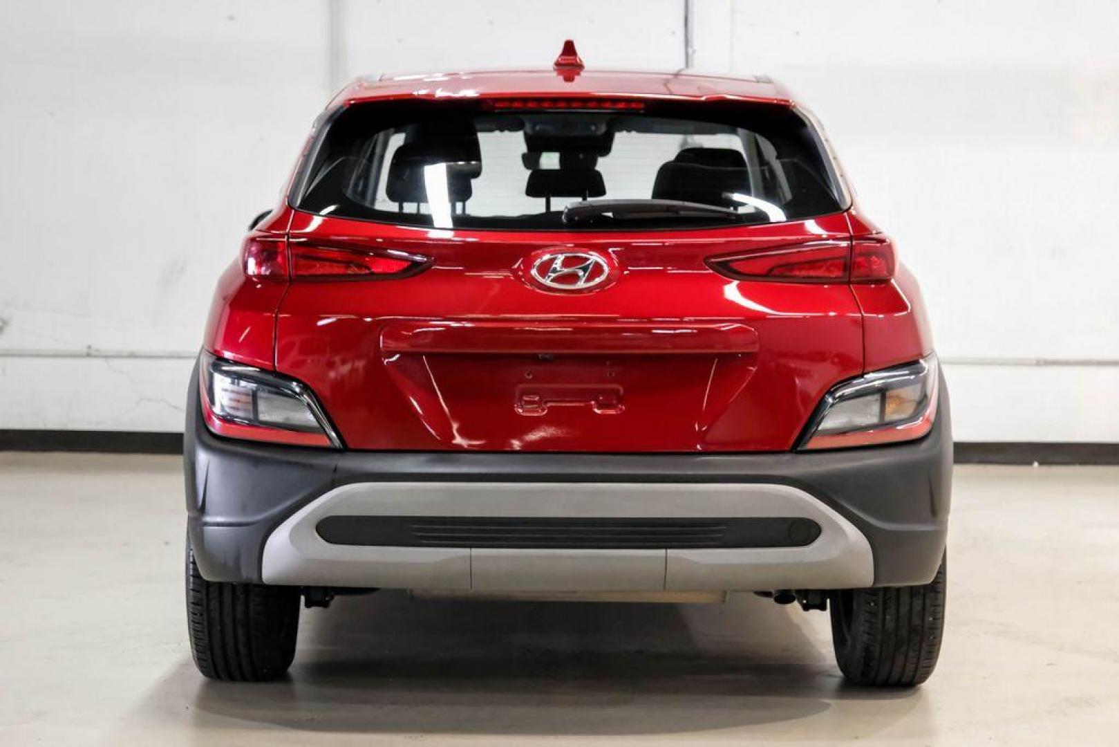 2023 Red /Black Hyundai Kona SE (KM8K22AB3PU) with an 2.0L I4 DOHC Dual CVVT engine, CVT transmission, located at 15300 Midway Rd., Addison, TX, 75001, (972) 702-0011, 32.958321, -96.838074 - Photo#8
