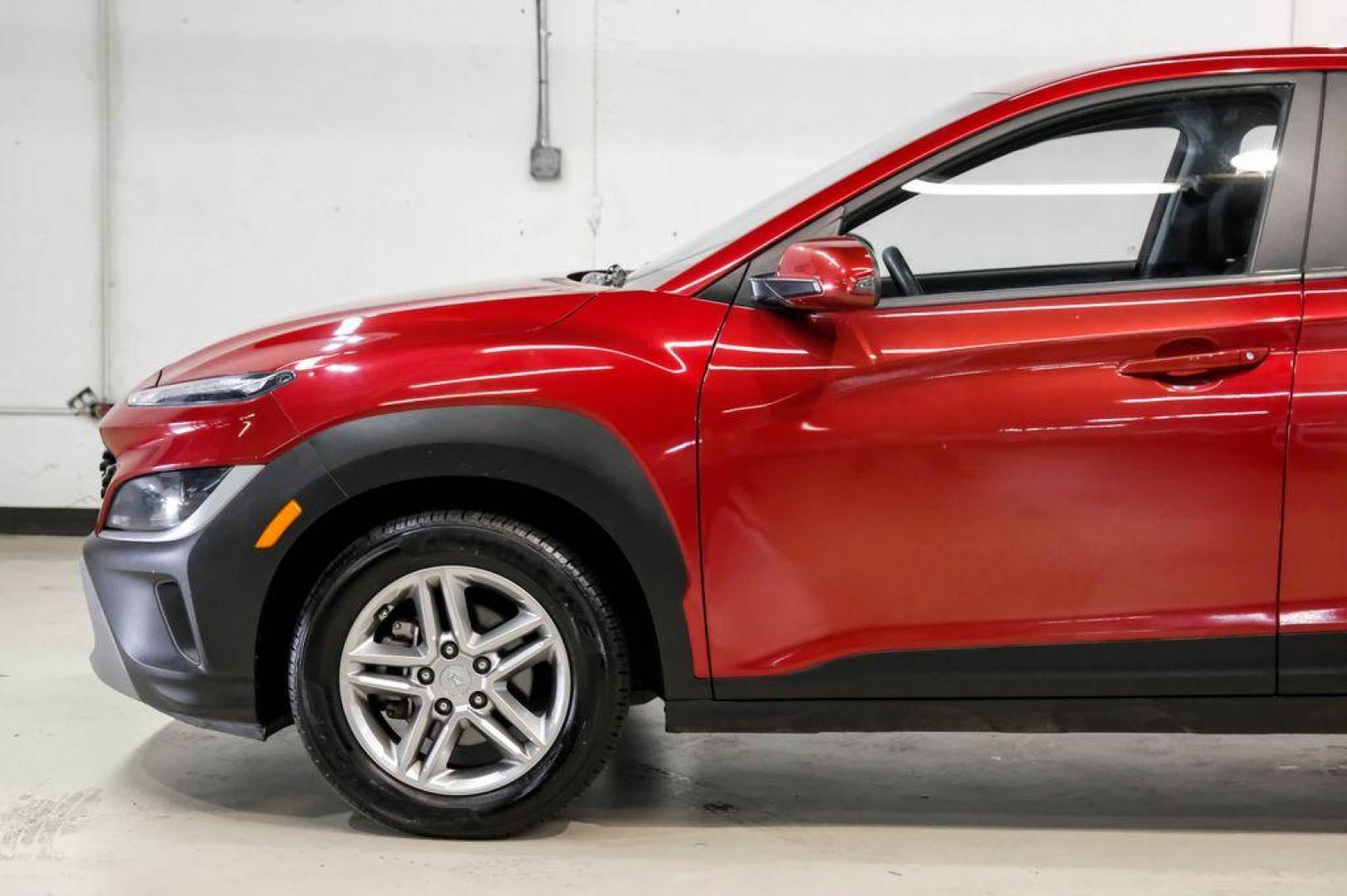 2023 Red /Black Hyundai Kona SE (KM8K22AB3PU) with an 2.0L I4 DOHC Dual CVVT engine, CVT transmission, located at 15300 Midway Rd., Addison, TX, 75001, (972) 702-0011, 32.958321, -96.838074 - Photo#11