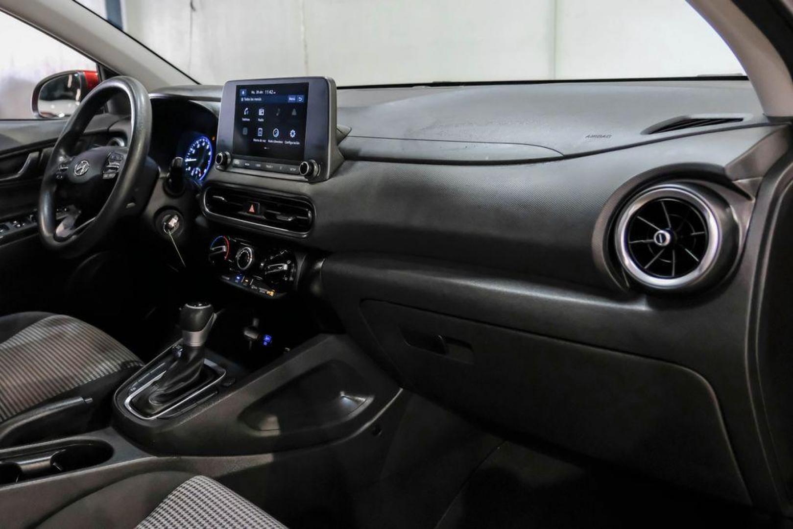 2023 Red /Black Hyundai Kona SE (KM8K22AB3PU) with an 2.0L I4 DOHC Dual CVVT engine, CVT transmission, located at 15300 Midway Rd., Addison, TX, 75001, (972) 702-0011, 32.958321, -96.838074 - Photo#13