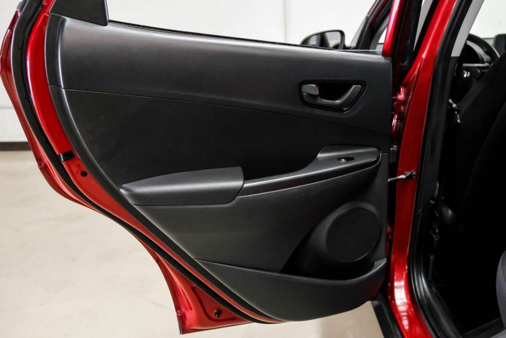 2023 Red /Black Hyundai Kona SE (KM8K22AB3PU) with an 2.0L I4 DOHC Dual CVVT engine, CVT transmission, located at 15300 Midway Rd., Addison, TX, 75001, (972) 702-0011, 32.958321, -96.838074 - Photo#42