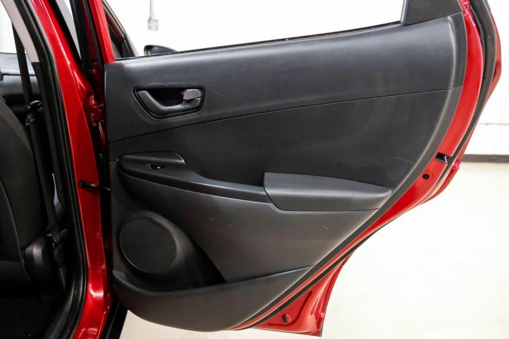 2023 Red /Black Hyundai Kona SE (KM8K22AB3PU) with an 2.0L I4 DOHC Dual CVVT engine, CVT transmission, located at 15300 Midway Rd., Addison, TX, 75001, (972) 702-0011, 32.958321, -96.838074 - Photo#43