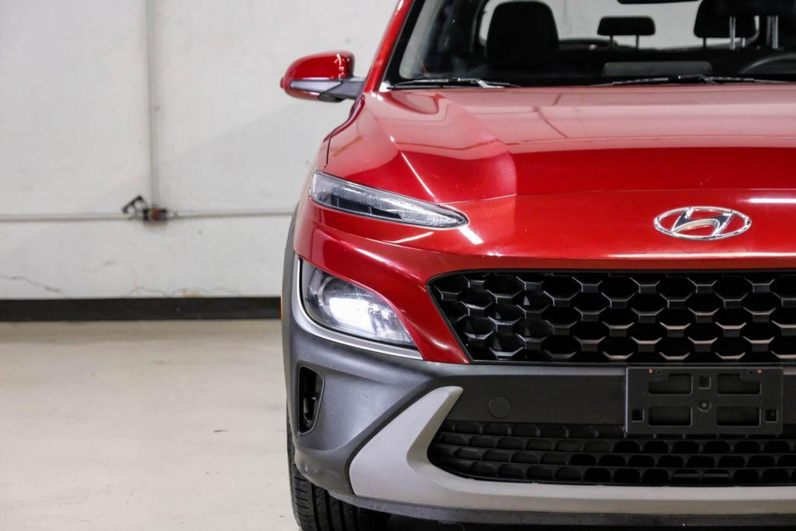 2023 Red /Black Hyundai Kona SE (KM8K22AB3PU) with an 2.0L I4 DOHC Dual CVVT engine, CVT transmission, located at 15300 Midway Rd., Addison, TX, 75001, (972) 702-0011, 32.958321, -96.838074 - Photo#44