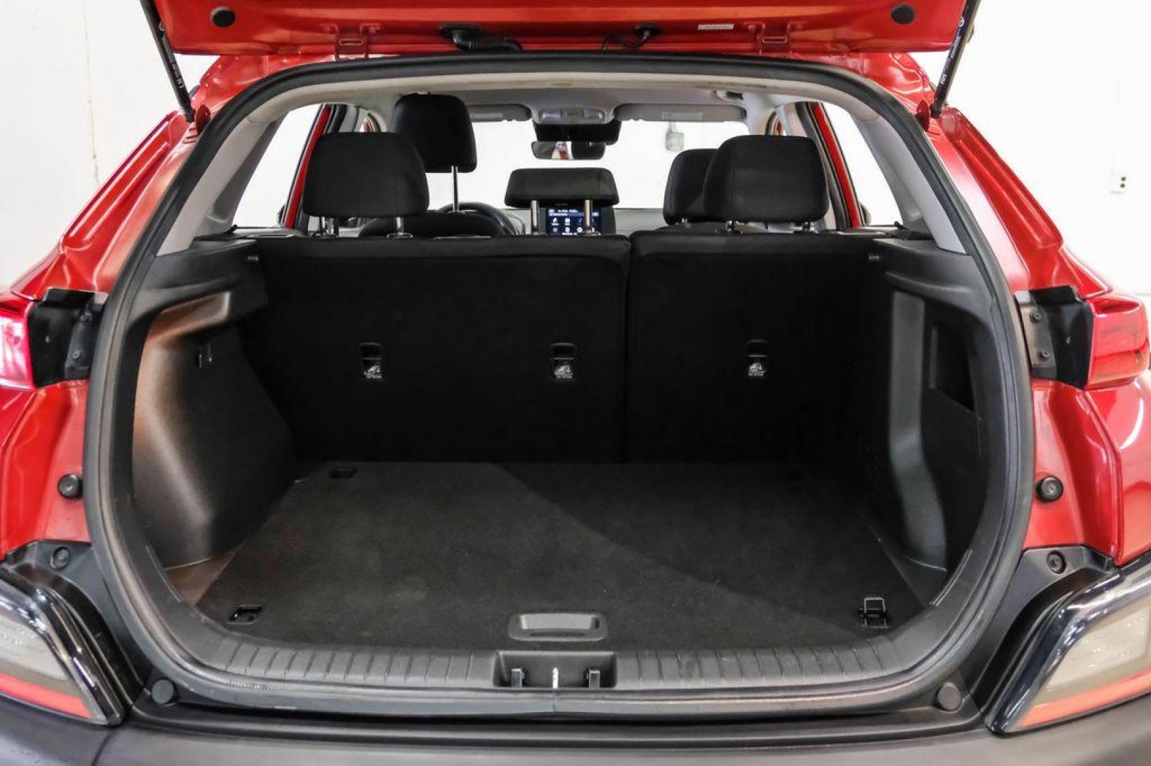 2023 Red /Black Hyundai Kona SE (KM8K22AB3PU) with an 2.0L I4 DOHC Dual CVVT engine, CVT transmission, located at 15300 Midway Rd., Addison, TX, 75001, (972) 702-0011, 32.958321, -96.838074 - Photo#51