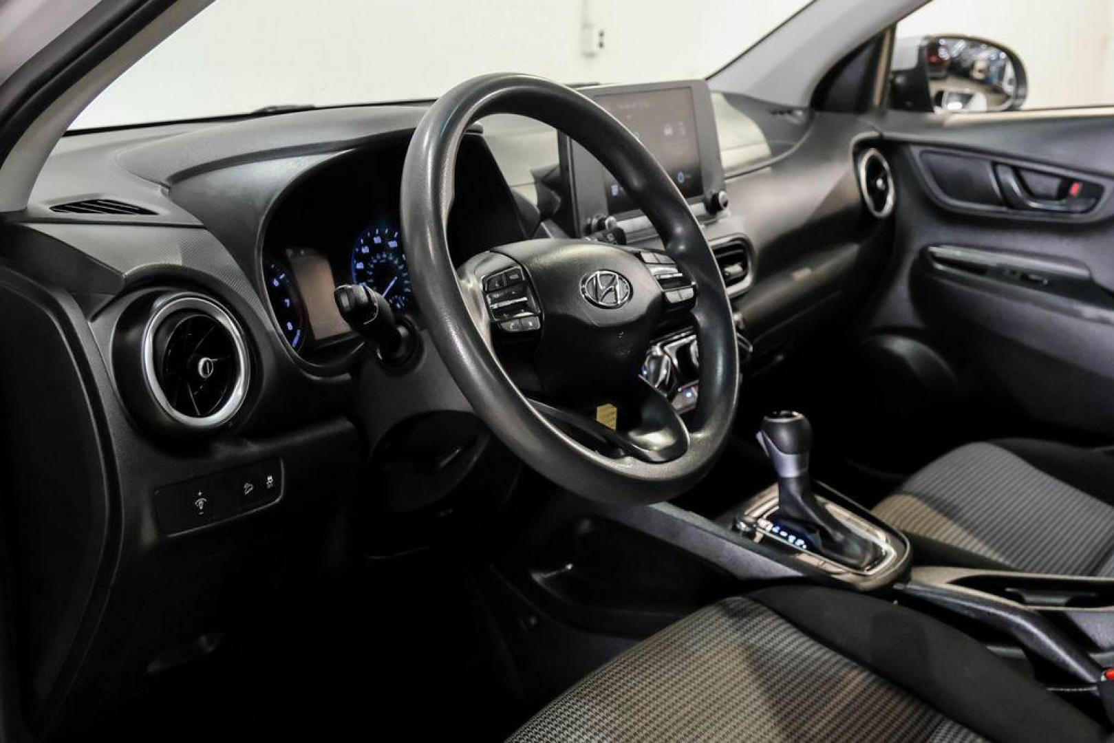 2023 Silver /Black Hyundai Kona SE (KM8K22AB3PU) with an 2.0L I4 DOHC Dual CVVT engine, CVT transmission, located at 15300 Midway Rd., Addison, TX, 75001, (972) 702-0011, 32.958321, -96.838074 - Photo#2