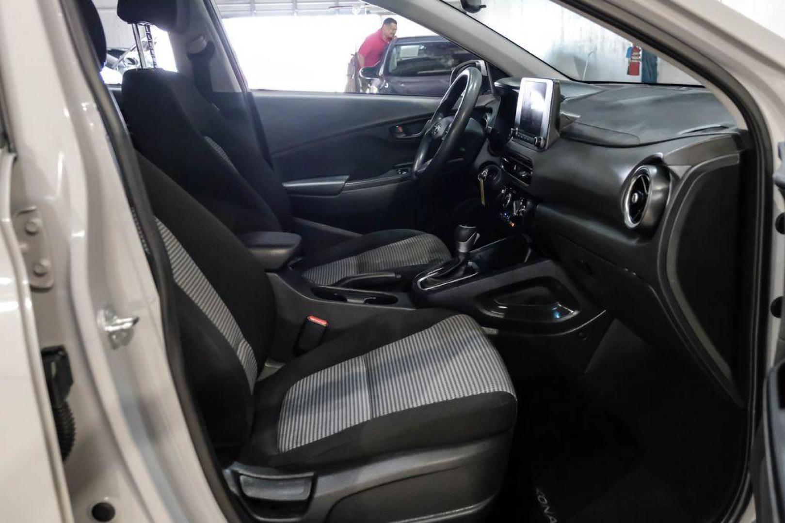 2023 Silver /Black Hyundai Kona SE (KM8K22AB3PU) with an 2.0L I4 DOHC Dual CVVT engine, CVT transmission, located at 15300 Midway Rd., Addison, TX, 75001, (972) 702-0011, 32.958321, -96.838074 - Photo#30