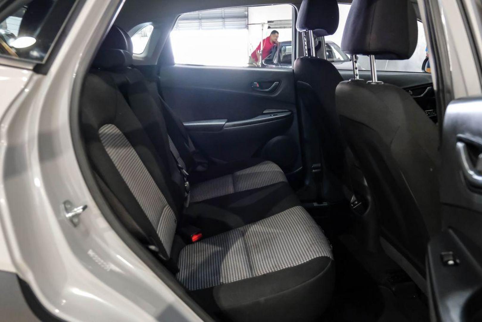 2023 Silver /Black Hyundai Kona SE (KM8K22AB3PU) with an 2.0L I4 DOHC Dual CVVT engine, CVT transmission, located at 15300 Midway Rd., Addison, TX, 75001, (972) 702-0011, 32.958321, -96.838074 - Photo#32