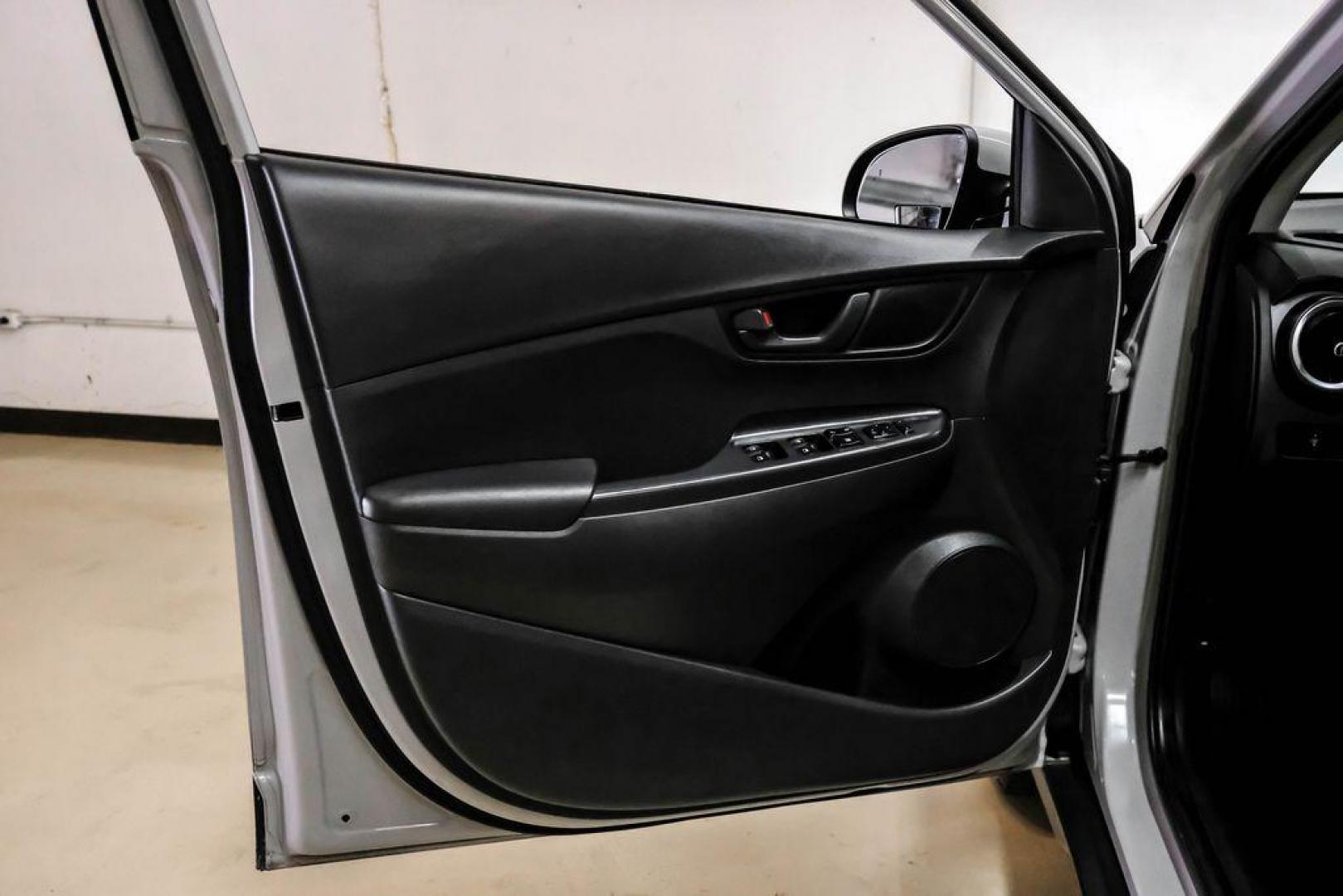 2023 Silver /Black Hyundai Kona SE (KM8K22AB3PU) with an 2.0L I4 DOHC Dual CVVT engine, CVT transmission, located at 15300 Midway Rd., Addison, TX, 75001, (972) 702-0011, 32.958321, -96.838074 - Photo#39