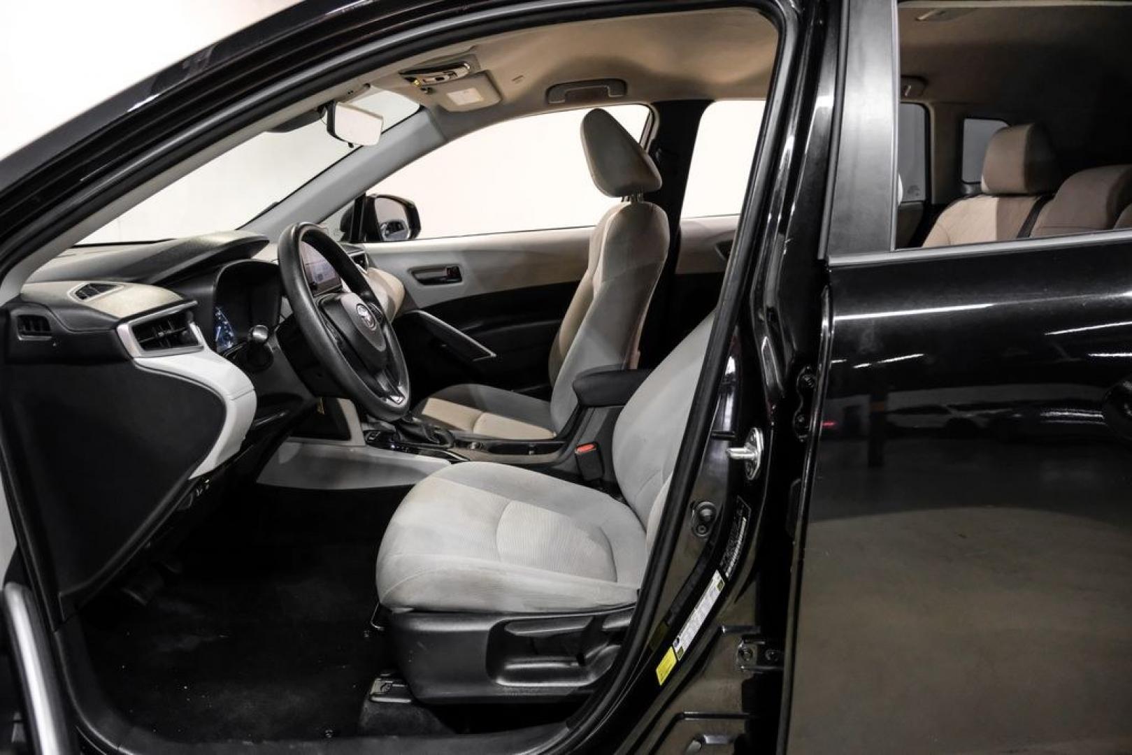 2023 Jet Black /Gray Toyota Corolla Cross L (7MUAAAAG1PV) with an 2.0L I4 PDI DOHC 16V LEV3-SULEV30 169hp engine, CVT transmission, located at 15300 Midway Rd., Addison, TX, 75001, (972) 702-0011, 32.958321, -96.838074 - Photo#3