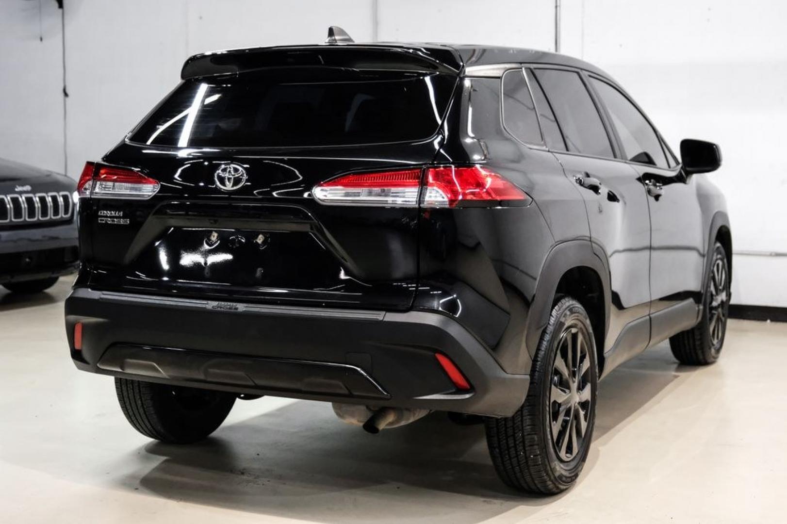 2023 Jet Black /Gray Toyota Corolla Cross L (7MUAAAAG1PV) with an 2.0L I4 PDI DOHC 16V LEV3-SULEV30 169hp engine, CVT transmission, located at 15300 Midway Rd., Addison, TX, 75001, (972) 702-0011, 32.958321, -96.838074 - Photo#7