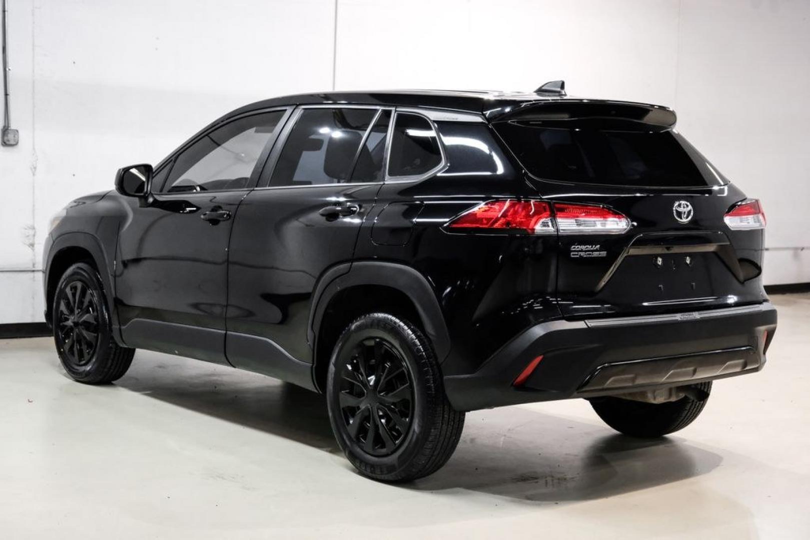 2023 Jet Black /Gray Toyota Corolla Cross L (7MUAAAAG1PV) with an 2.0L I4 PDI DOHC 16V LEV3-SULEV30 169hp engine, CVT transmission, located at 15300 Midway Rd., Addison, TX, 75001, (972) 702-0011, 32.958321, -96.838074 - Photo#9