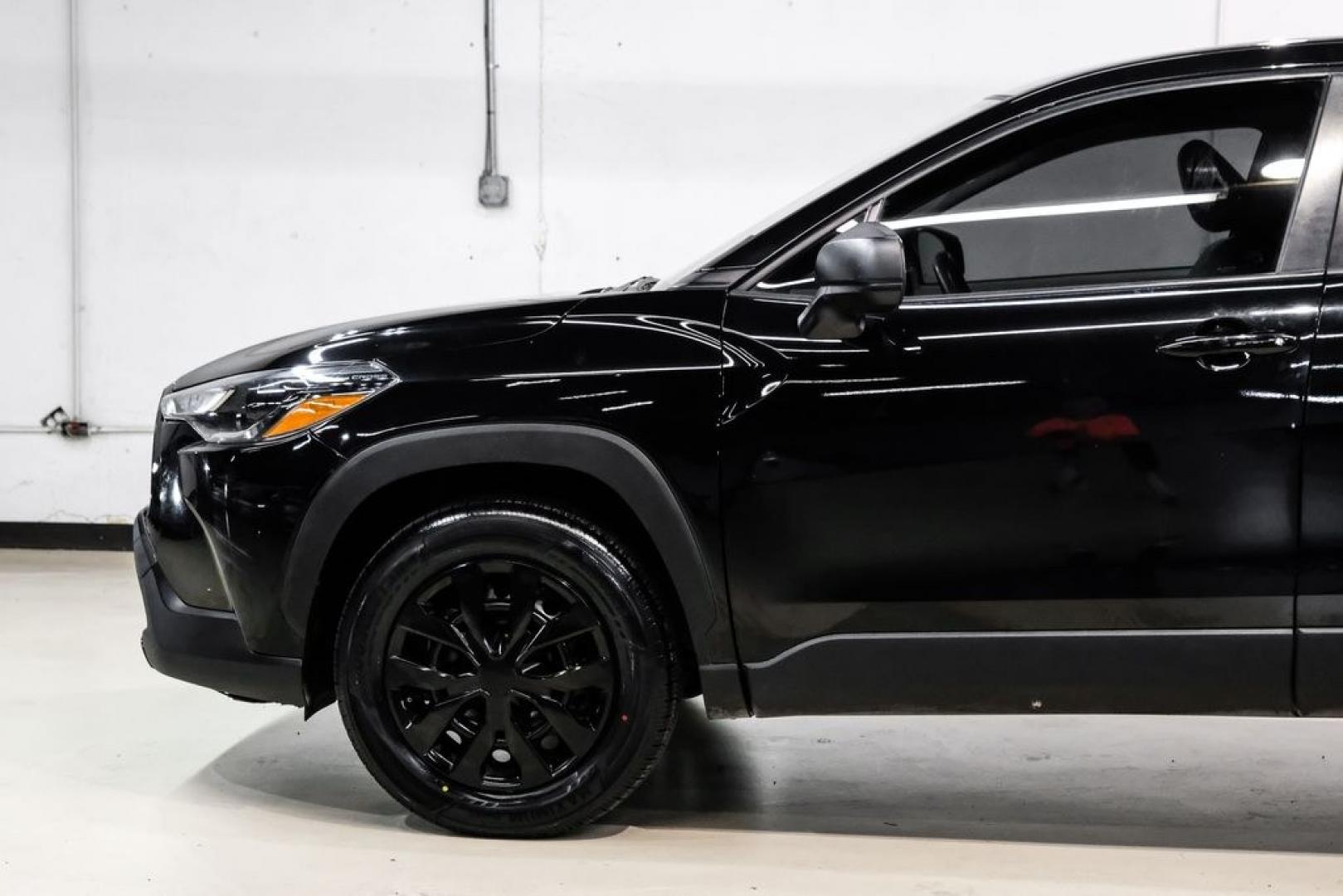 2023 Jet Black /Gray Toyota Corolla Cross L (7MUAAAAG1PV) with an 2.0L I4 PDI DOHC 16V LEV3-SULEV30 169hp engine, CVT transmission, located at 15300 Midway Rd., Addison, TX, 75001, (972) 702-0011, 32.958321, -96.838074 - Photo#11