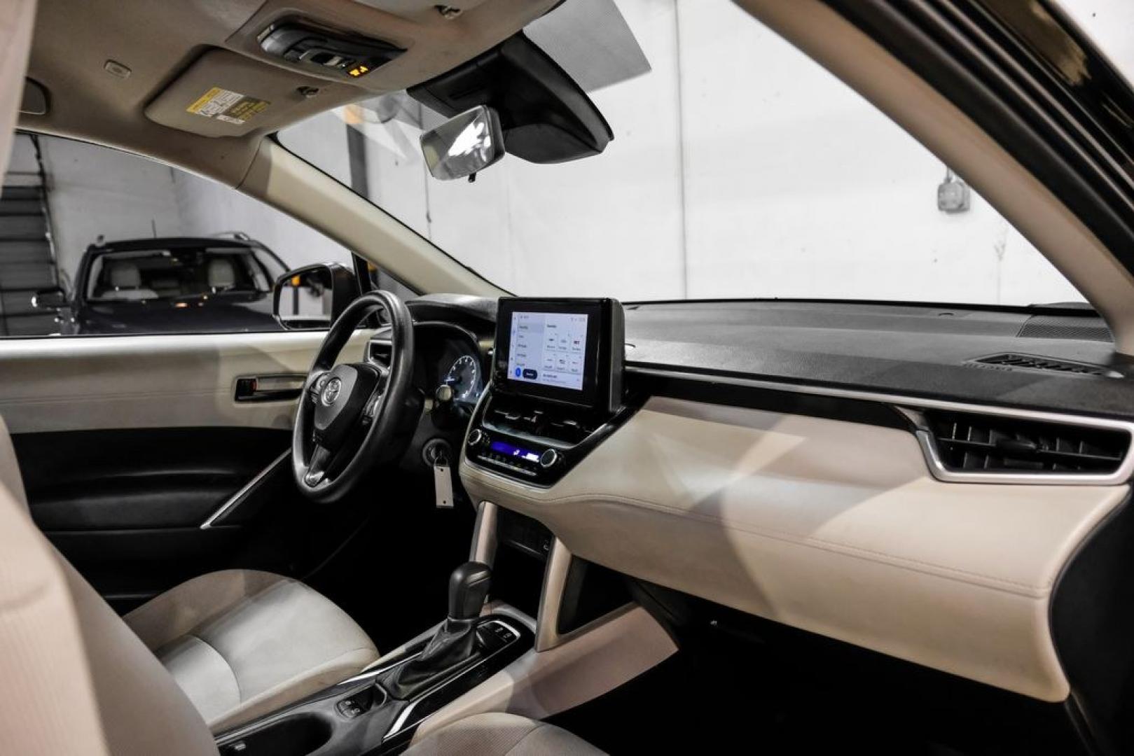 2023 Jet Black /Gray Toyota Corolla Cross L (7MUAAAAG1PV) with an 2.0L I4 PDI DOHC 16V LEV3-SULEV30 169hp engine, CVT transmission, located at 15300 Midway Rd., Addison, TX, 75001, (972) 702-0011, 32.958321, -96.838074 - Photo#13