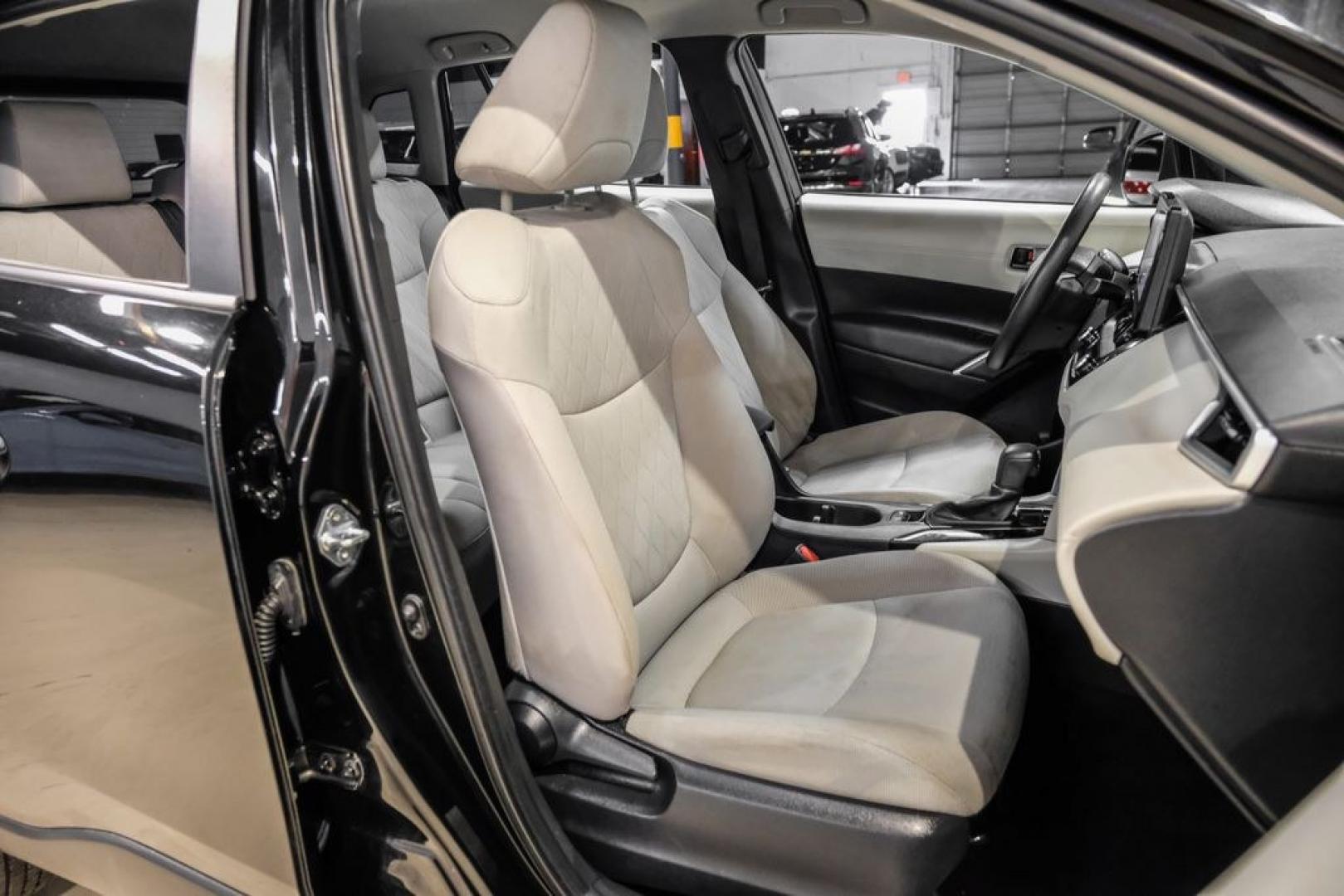 2023 Jet Black /Gray Toyota Corolla Cross L (7MUAAAAG1PV) with an 2.0L I4 PDI DOHC 16V LEV3-SULEV30 169hp engine, CVT transmission, located at 15300 Midway Rd., Addison, TX, 75001, (972) 702-0011, 32.958321, -96.838074 - Photo#27