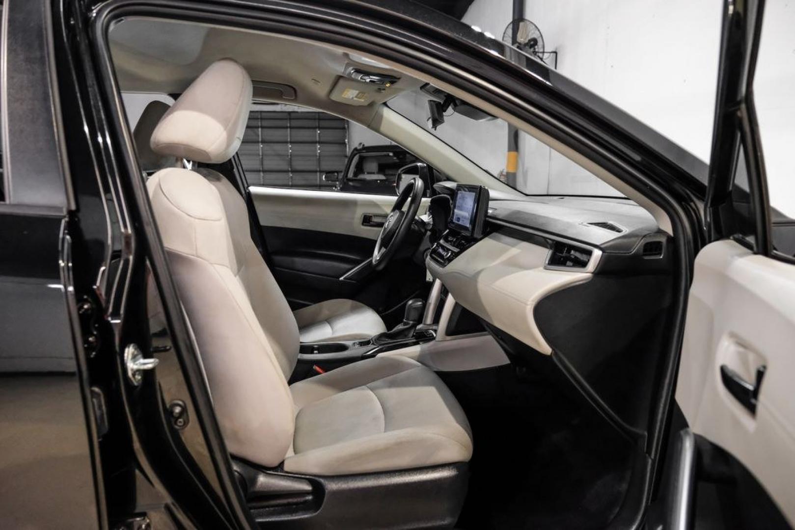2023 Jet Black /Gray Toyota Corolla Cross L (7MUAAAAG1PV) with an 2.0L I4 PDI DOHC 16V LEV3-SULEV30 169hp engine, CVT transmission, located at 15300 Midway Rd., Addison, TX, 75001, (972) 702-0011, 32.958321, -96.838074 - Photo#28