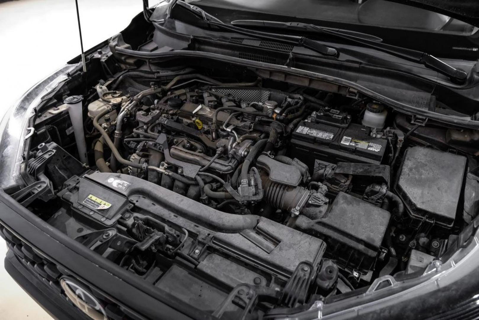 2023 Jet Black /Gray Toyota Corolla Cross L (7MUAAAAG1PV) with an 2.0L I4 PDI DOHC 16V LEV3-SULEV30 169hp engine, CVT transmission, located at 15300 Midway Rd., Addison, TX, 75001, (972) 702-0011, 32.958321, -96.838074 - Photo#41