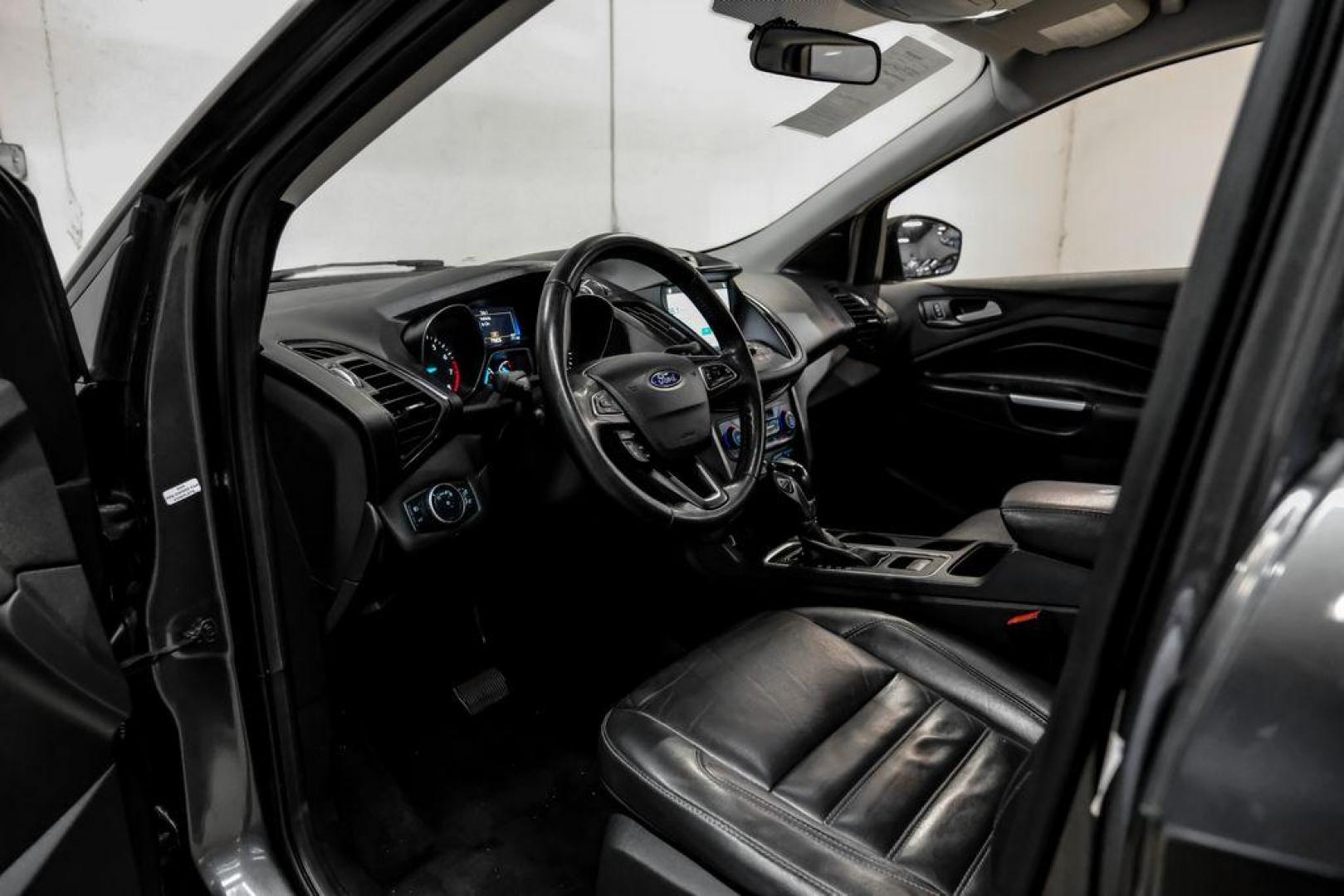 2018 Magnetic Metallic /Charcoal Black Ford Escape SEL (1FMCU9H92JU) with an EcoBoost 2.0L I4 GTDi DOHC Turbocharged VCT engine, Automatic transmission, located at 15300 Midway Rd., Addison, TX, 75001, (972) 702-0011, 32.958321, -96.838074 - Photo#2