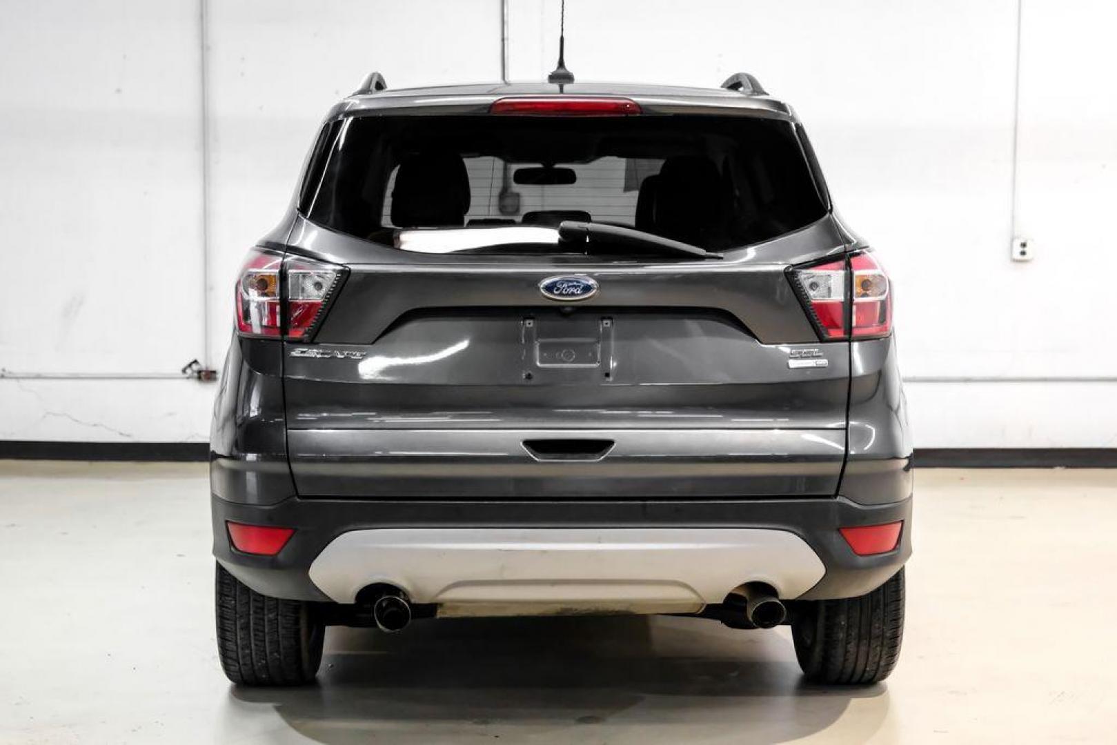 2018 Magnetic Metallic /Charcoal Black Ford Escape SEL (1FMCU9H92JU) with an EcoBoost 2.0L I4 GTDi DOHC Turbocharged VCT engine, Automatic transmission, located at 15300 Midway Rd., Addison, TX, 75001, (972) 702-0011, 32.958321, -96.838074 - Photo#8