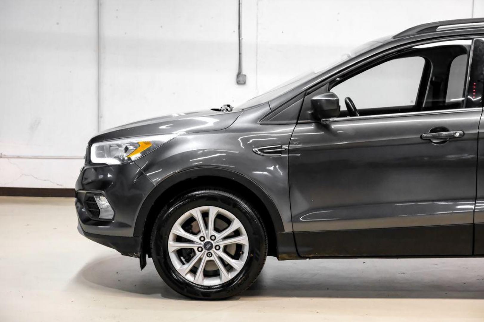 2018 Magnetic Metallic /Charcoal Black Ford Escape SEL (1FMCU9H92JU) with an EcoBoost 2.0L I4 GTDi DOHC Turbocharged VCT engine, Automatic transmission, located at 15300 Midway Rd., Addison, TX, 75001, (972) 702-0011, 32.958321, -96.838074 - Photo#11
