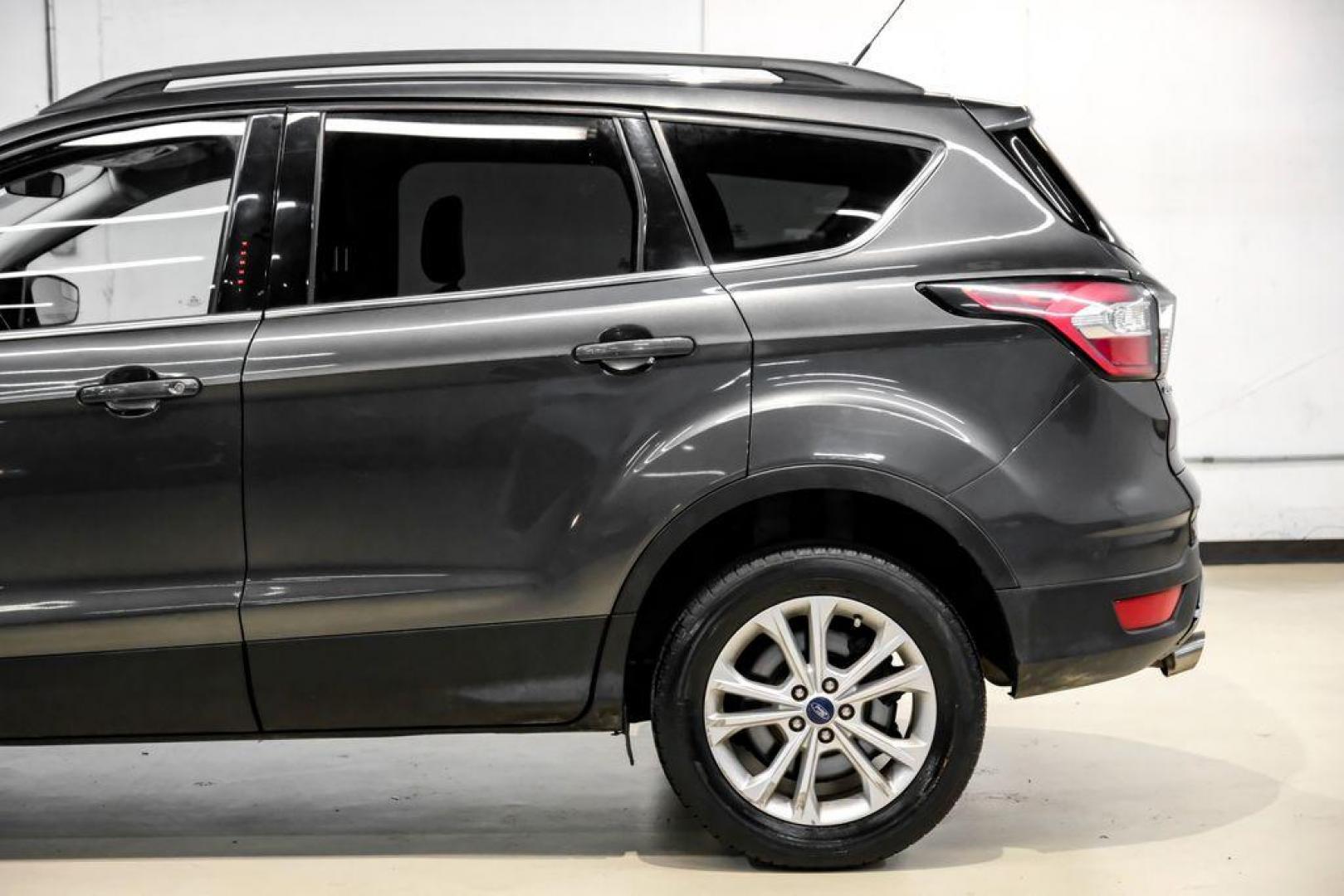 2018 Magnetic Metallic /Charcoal Black Ford Escape SEL (1FMCU9H92JU) with an EcoBoost 2.0L I4 GTDi DOHC Turbocharged VCT engine, Automatic transmission, located at 15300 Midway Rd., Addison, TX, 75001, (972) 702-0011, 32.958321, -96.838074 - Photo#12