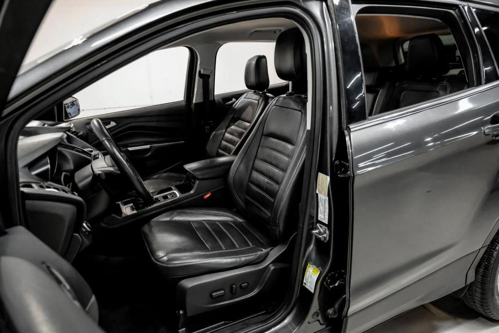 2018 Magnetic Metallic /Charcoal Black Ford Escape SEL (1FMCU9H92JU) with an EcoBoost 2.0L I4 GTDi DOHC Turbocharged VCT engine, Automatic transmission, located at 15300 Midway Rd., Addison, TX, 75001, (972) 702-0011, 32.958321, -96.838074 - Photo#29