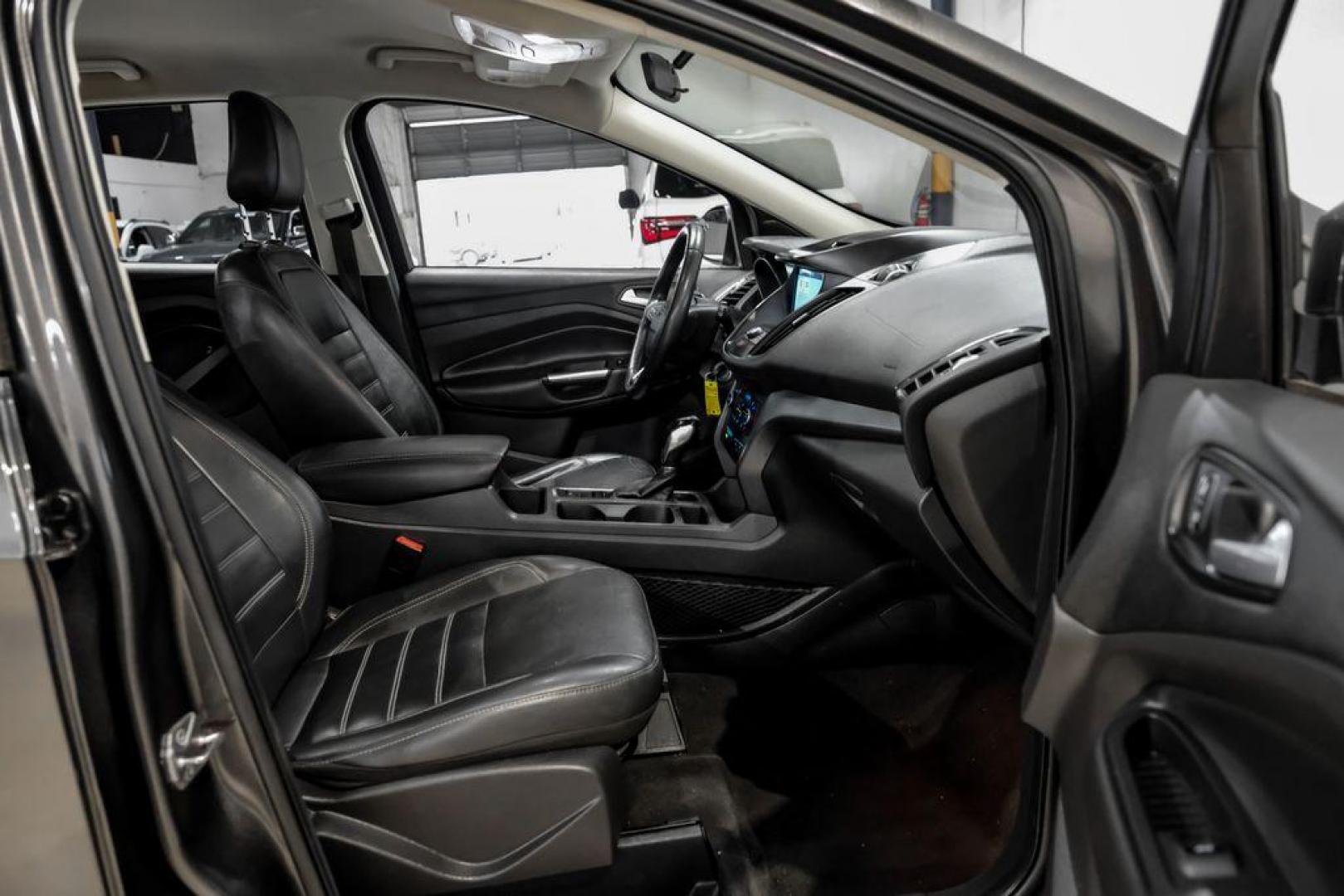 2018 Magnetic Metallic /Charcoal Black Ford Escape SEL (1FMCU9H92JU) with an EcoBoost 2.0L I4 GTDi DOHC Turbocharged VCT engine, Automatic transmission, located at 15300 Midway Rd., Addison, TX, 75001, (972) 702-0011, 32.958321, -96.838074 - Photo#31