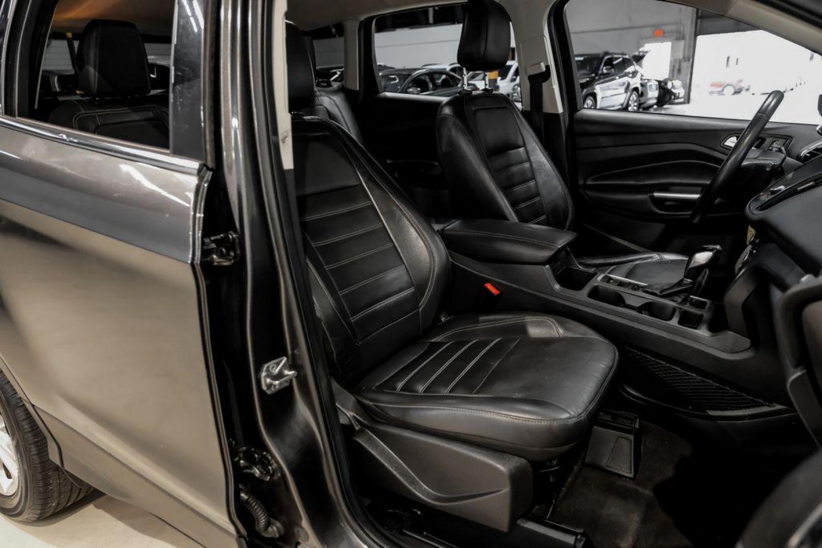 2018 Magnetic Metallic /Charcoal Black Ford Escape SEL (1FMCU9H92JU) with an EcoBoost 2.0L I4 GTDi DOHC Turbocharged VCT engine, Automatic transmission, located at 15300 Midway Rd., Addison, TX, 75001, (972) 702-0011, 32.958321, -96.838074 - Photo#32