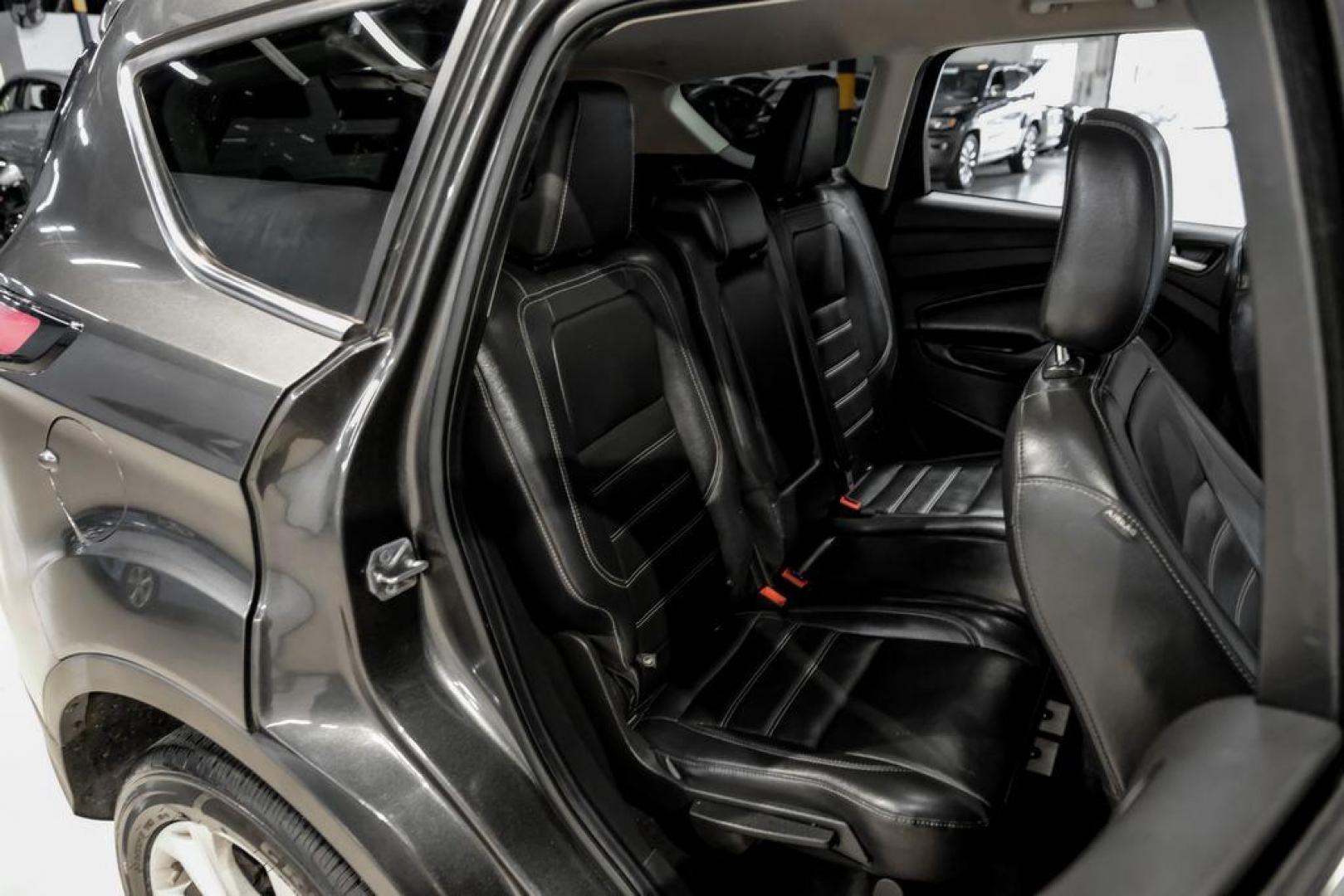 2018 Magnetic Metallic /Charcoal Black Ford Escape SEL (1FMCU9H92JU) with an EcoBoost 2.0L I4 GTDi DOHC Turbocharged VCT engine, Automatic transmission, located at 15300 Midway Rd., Addison, TX, 75001, (972) 702-0011, 32.958321, -96.838074 - Photo#33