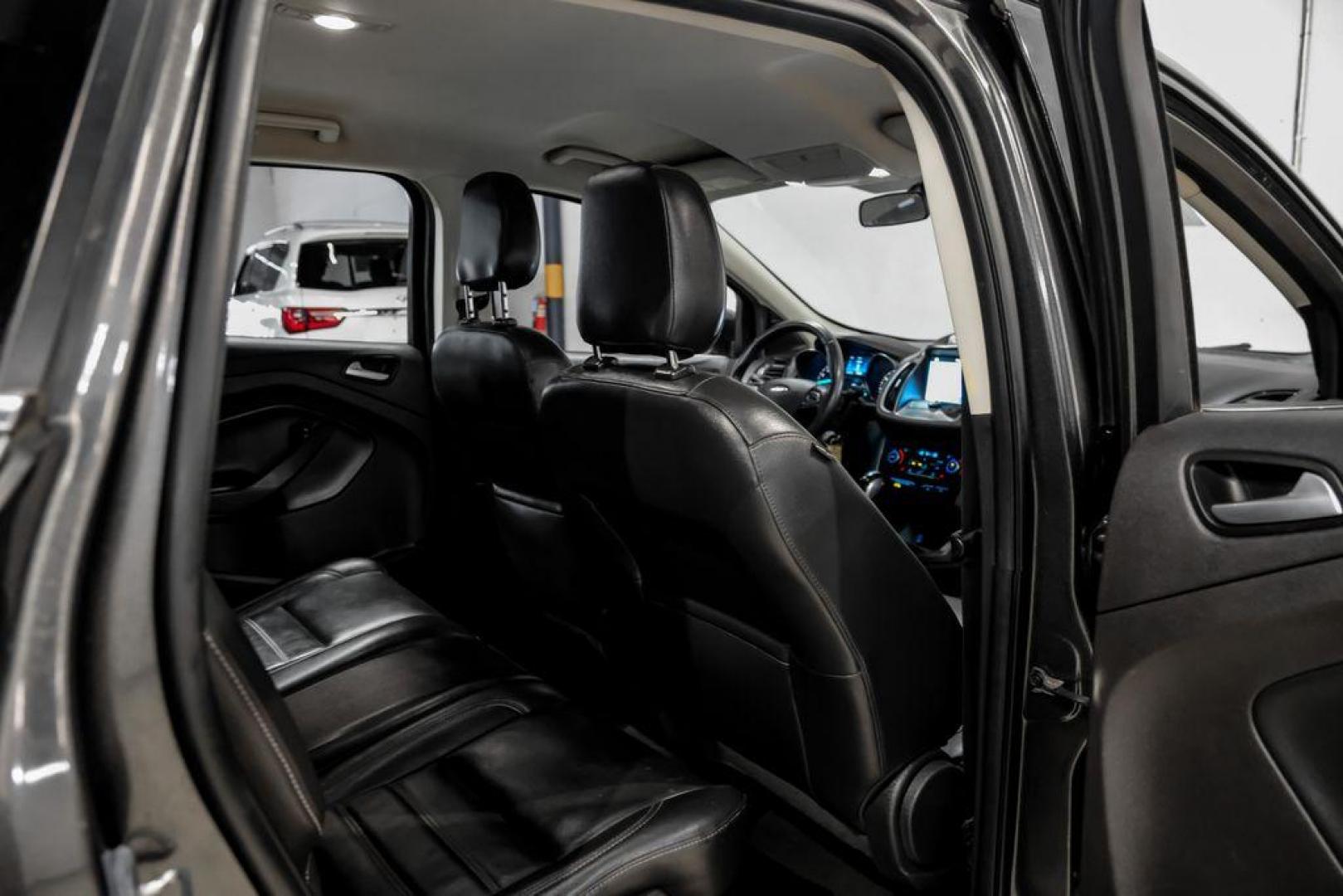 2018 Magnetic Metallic /Charcoal Black Ford Escape SEL (1FMCU9H92JU) with an EcoBoost 2.0L I4 GTDi DOHC Turbocharged VCT engine, Automatic transmission, located at 15300 Midway Rd., Addison, TX, 75001, (972) 702-0011, 32.958321, -96.838074 - Photo#34