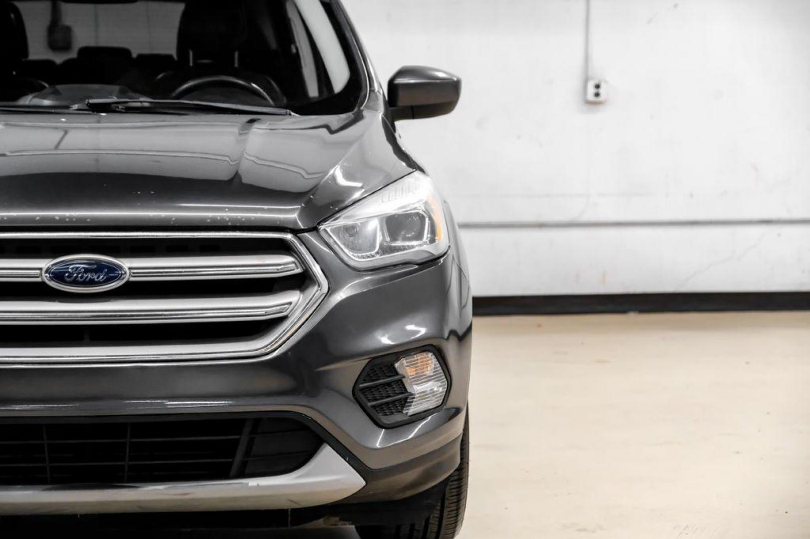 2018 Magnetic Metallic /Charcoal Black Ford Escape SEL (1FMCU9H92JU) with an EcoBoost 2.0L I4 GTDi DOHC Turbocharged VCT engine, Automatic transmission, located at 15300 Midway Rd., Addison, TX, 75001, (972) 702-0011, 32.958321, -96.838074 - Photo#44