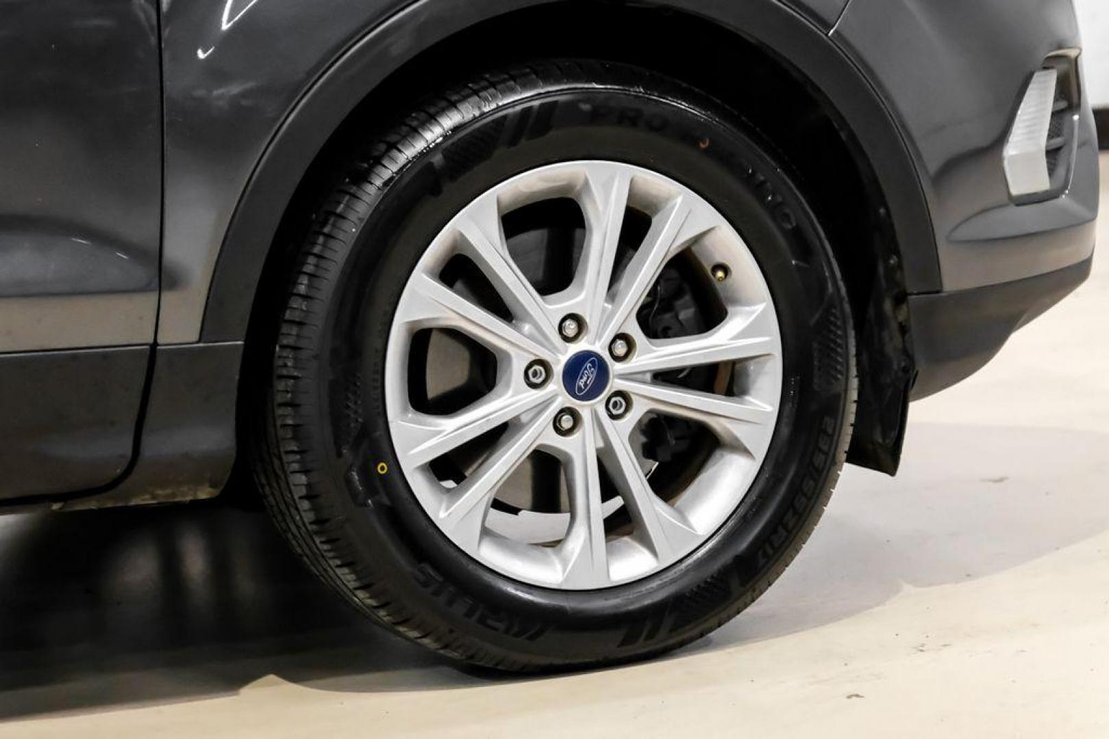 2018 Magnetic Metallic /Charcoal Black Ford Escape SEL (1FMCU9H92JU) with an EcoBoost 2.0L I4 GTDi DOHC Turbocharged VCT engine, Automatic transmission, located at 15300 Midway Rd., Addison, TX, 75001, (972) 702-0011, 32.958321, -96.838074 - Photo#52