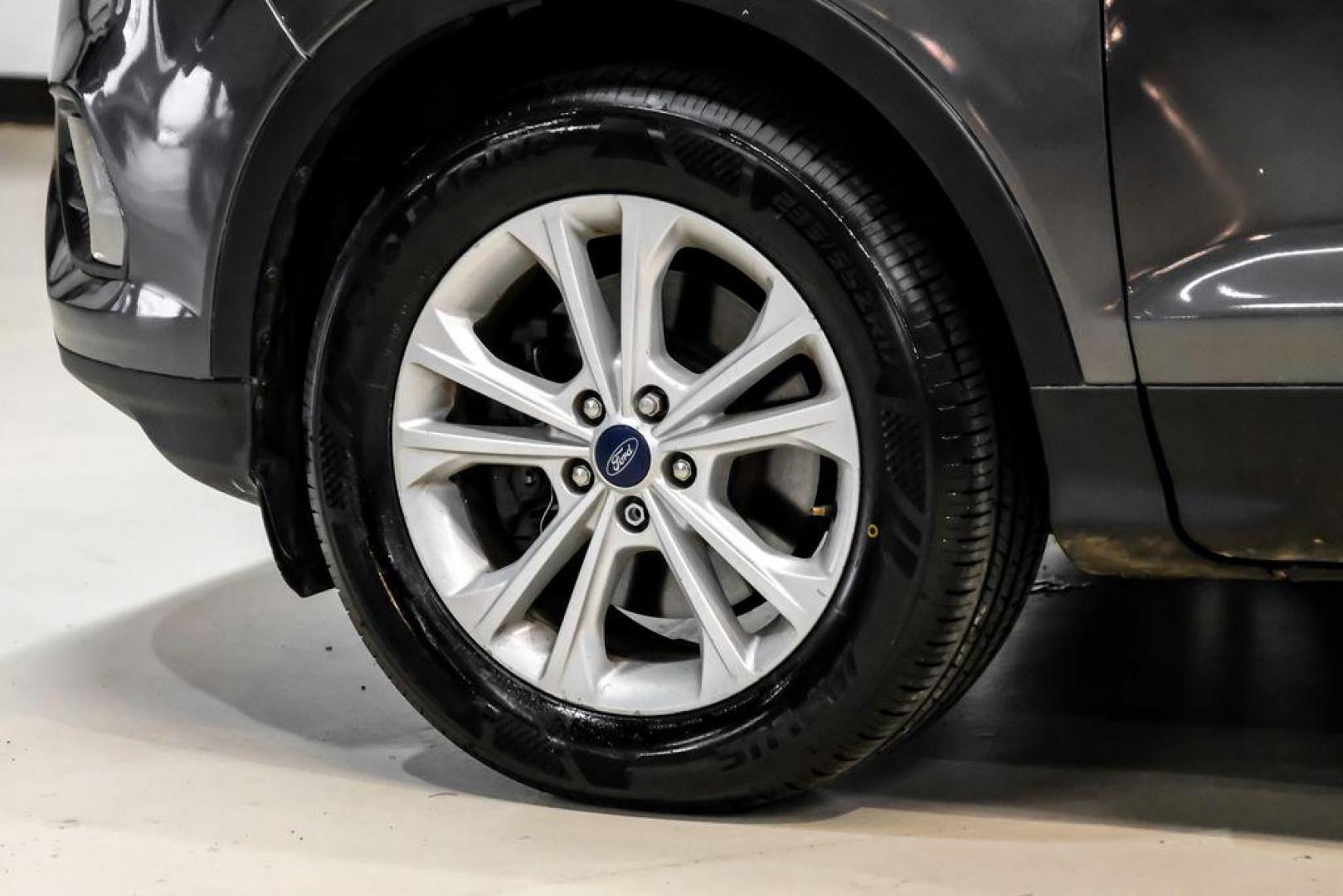 2018 Magnetic Metallic /Charcoal Black Ford Escape SEL (1FMCU9H92JU) with an EcoBoost 2.0L I4 GTDi DOHC Turbocharged VCT engine, Automatic transmission, located at 15300 Midway Rd., Addison, TX, 75001, (972) 702-0011, 32.958321, -96.838074 - Photo#53