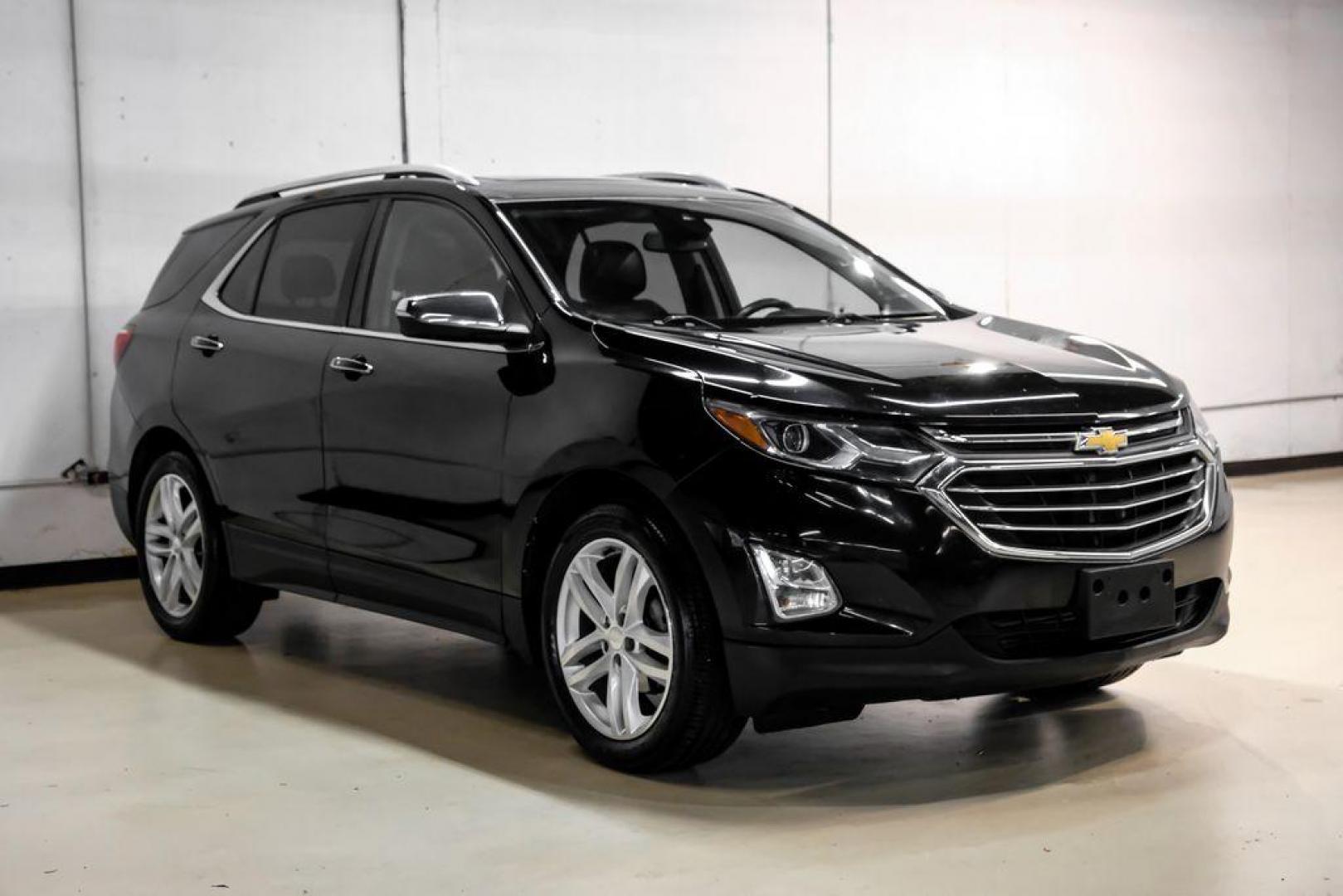 2018 Black Metallic /Jet Black Chevrolet Equinox Premier (3GNAXMEV4JL) with an 1.5L DOHC engine, Automatic transmission, located at 15300 Midway Rd., Addison, TX, 75001, (972) 702-0011, 32.958321, -96.838074 - Photo#5