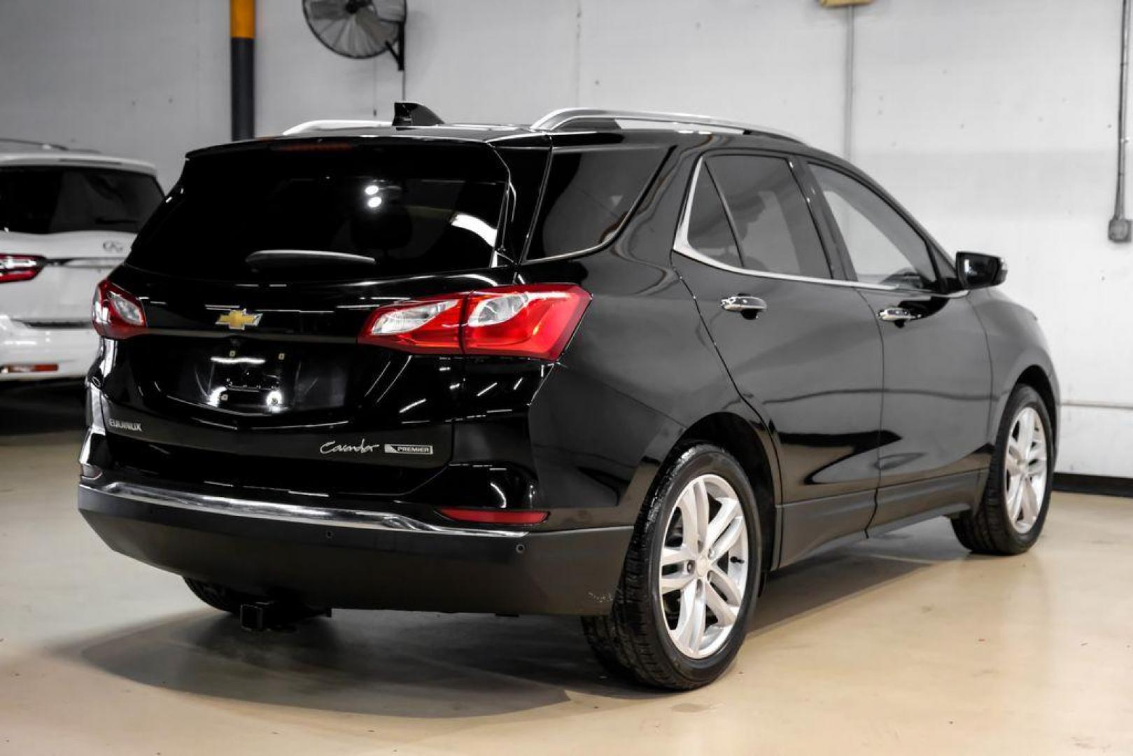 2018 Black Metallic /Jet Black Chevrolet Equinox Premier (3GNAXMEV4JL) with an 1.5L DOHC engine, Automatic transmission, located at 15300 Midway Rd., Addison, TX, 75001, (972) 702-0011, 32.958321, -96.838074 - Photo#7