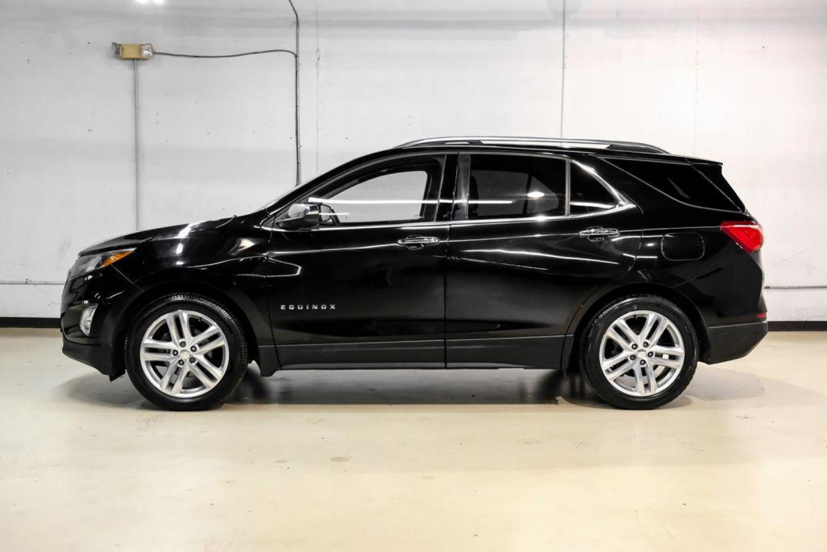 2018 Black Metallic /Jet Black Chevrolet Equinox Premier (3GNAXMEV4JL) with an 1.5L DOHC engine, Automatic transmission, located at 15300 Midway Rd., Addison, TX, 75001, (972) 702-0011, 32.958321, -96.838074 - Photo#10