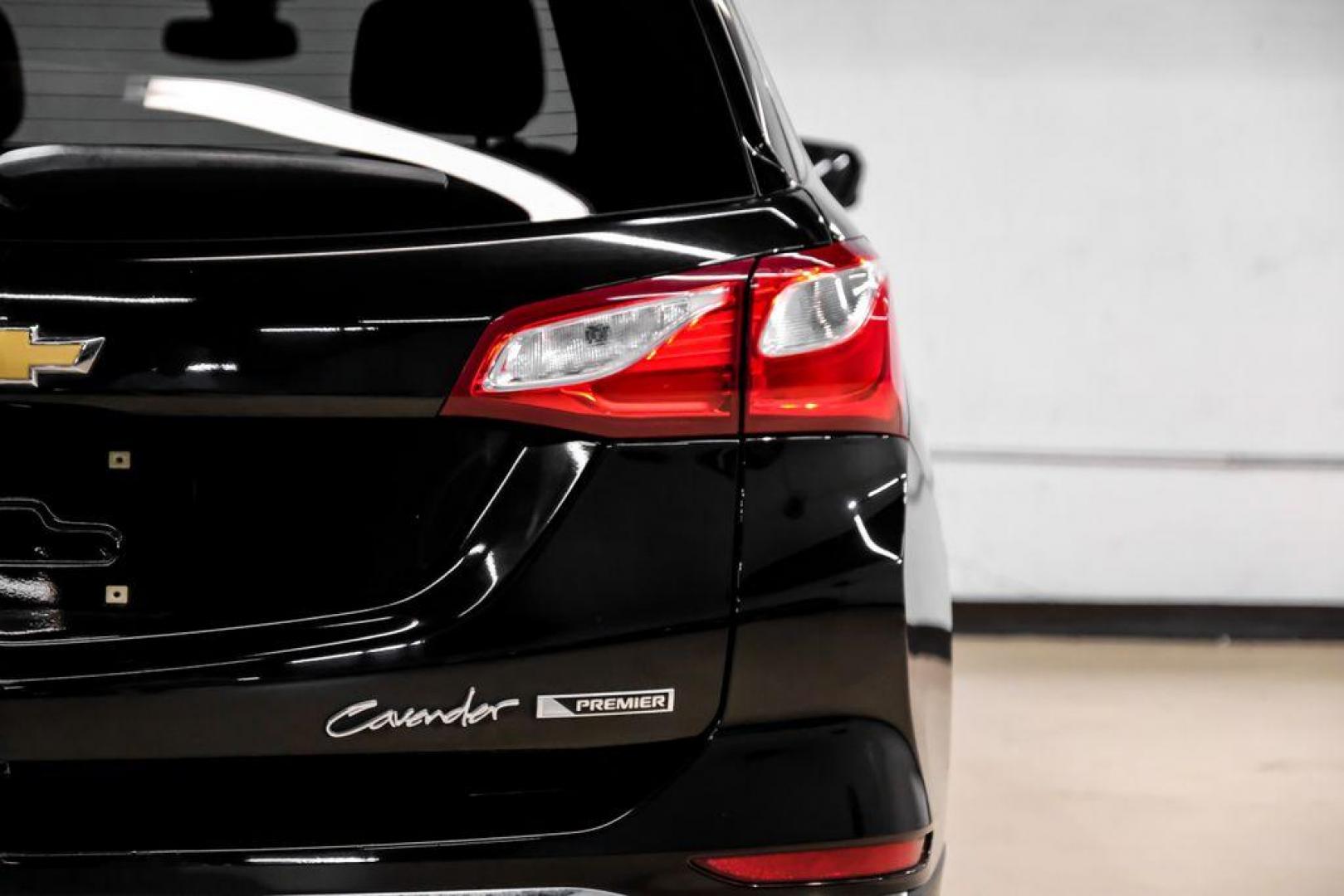 2018 Black Metallic /Jet Black Chevrolet Equinox Premier (3GNAXMEV4JL) with an 1.5L DOHC engine, Automatic transmission, located at 15300 Midway Rd., Addison, TX, 75001, (972) 702-0011, 32.958321, -96.838074 - Photo#44