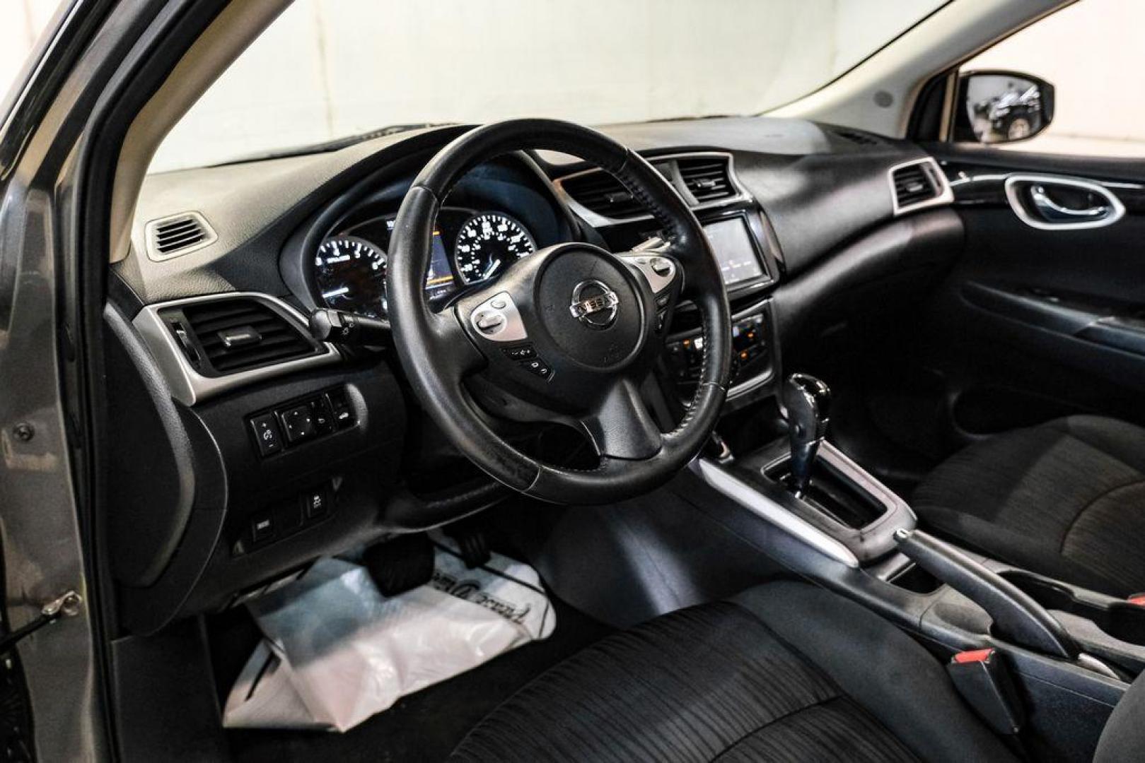 2019 Gun Metallic /Charcoal Nissan Sentra SV (3N1AB7AP7KY) with an 1.8L 4-Cylinder DOHC 16V engine, CVT transmission, located at 15300 Midway Rd., Addison, TX, 75001, (972) 702-0011, 32.958321, -96.838074 - Photo#2