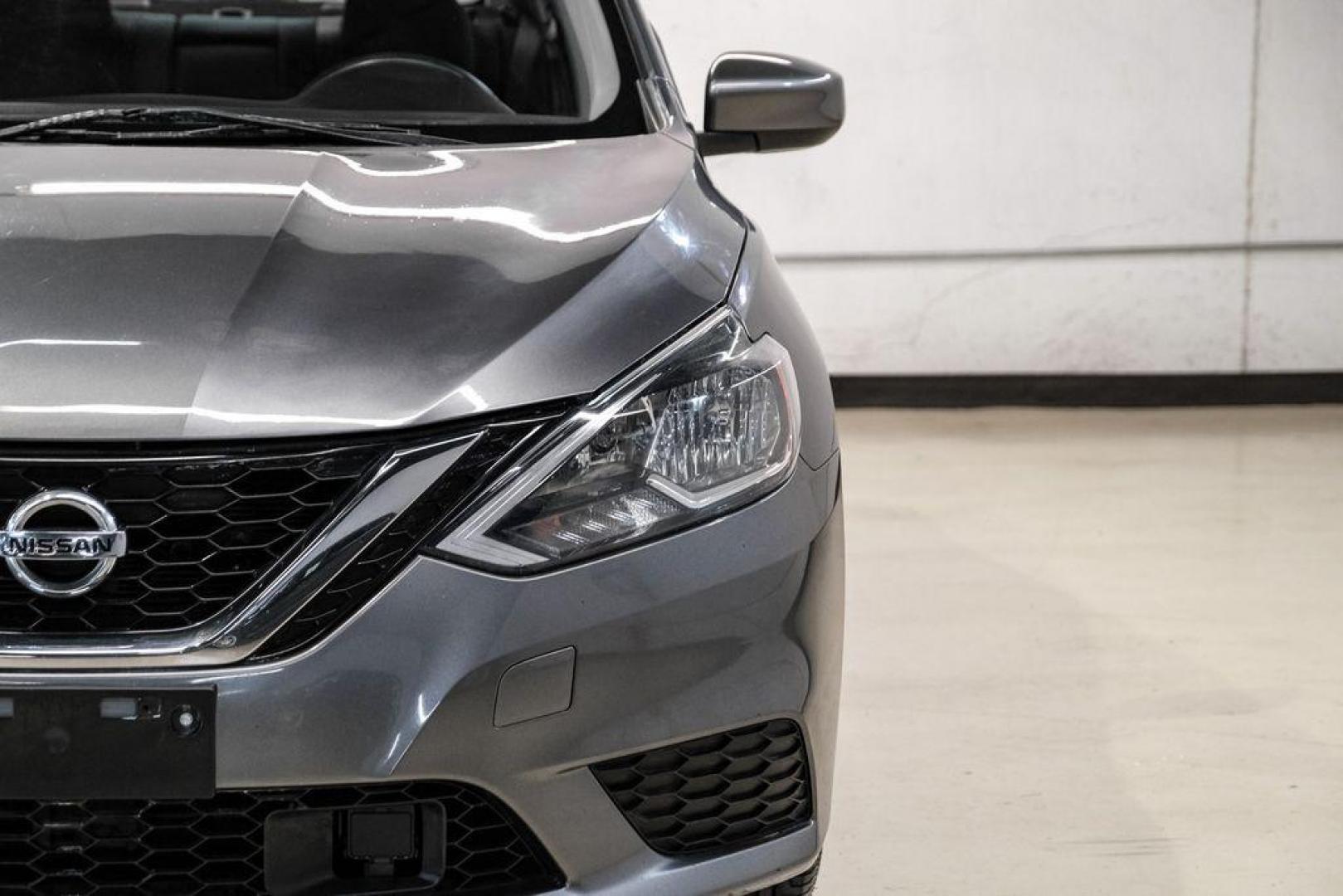 2019 Gun Metallic /Charcoal Nissan Sentra SV (3N1AB7AP7KY) with an 1.8L 4-Cylinder DOHC 16V engine, CVT transmission, located at 15300 Midway Rd., Addison, TX, 75001, (972) 702-0011, 32.958321, -96.838074 - Photo#43
