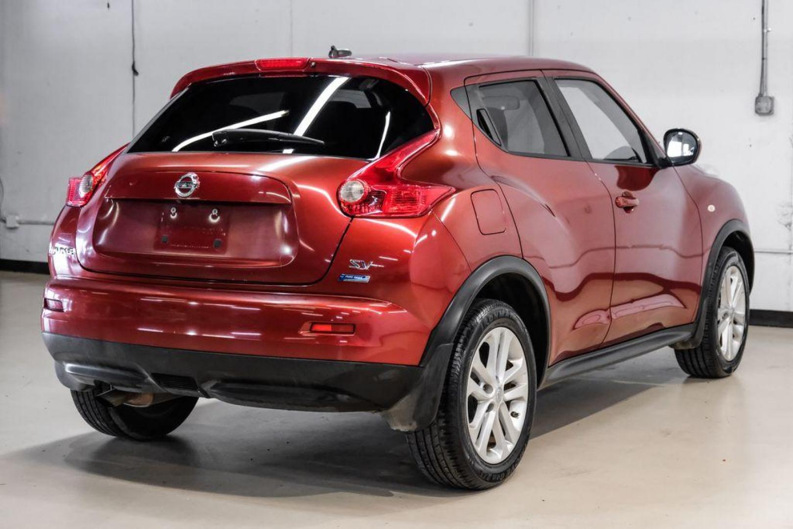 2013 Cayenne Red /Black Nissan Juke SV (JN8AF5MRXDT) with an 1.6L I4 DOHC 16V engine, CVT transmission, located at 15300 Midway Rd., Addison, TX, 75001, (972) 702-0011, 32.958321, -96.838074 - Photo#8
