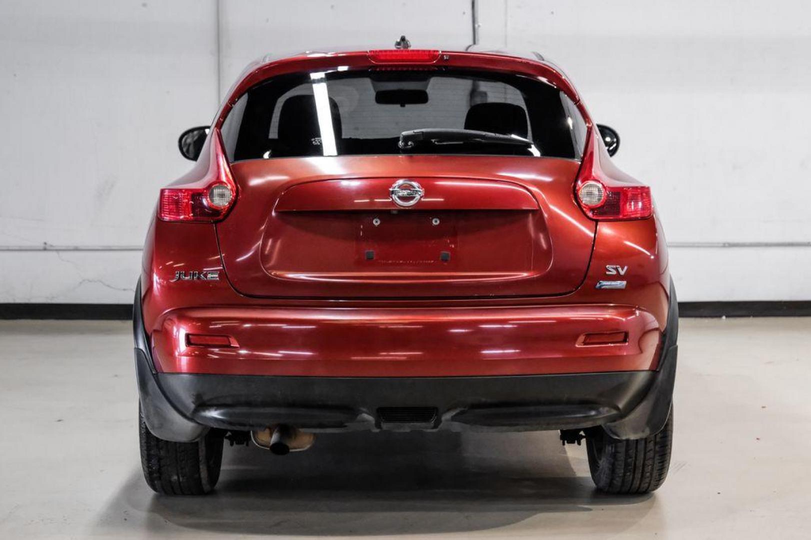 2013 Cayenne Red /Black Nissan Juke SV (JN8AF5MRXDT) with an 1.6L I4 DOHC 16V engine, CVT transmission, located at 15300 Midway Rd., Addison, TX, 75001, (972) 702-0011, 32.958321, -96.838074 - Photo#9