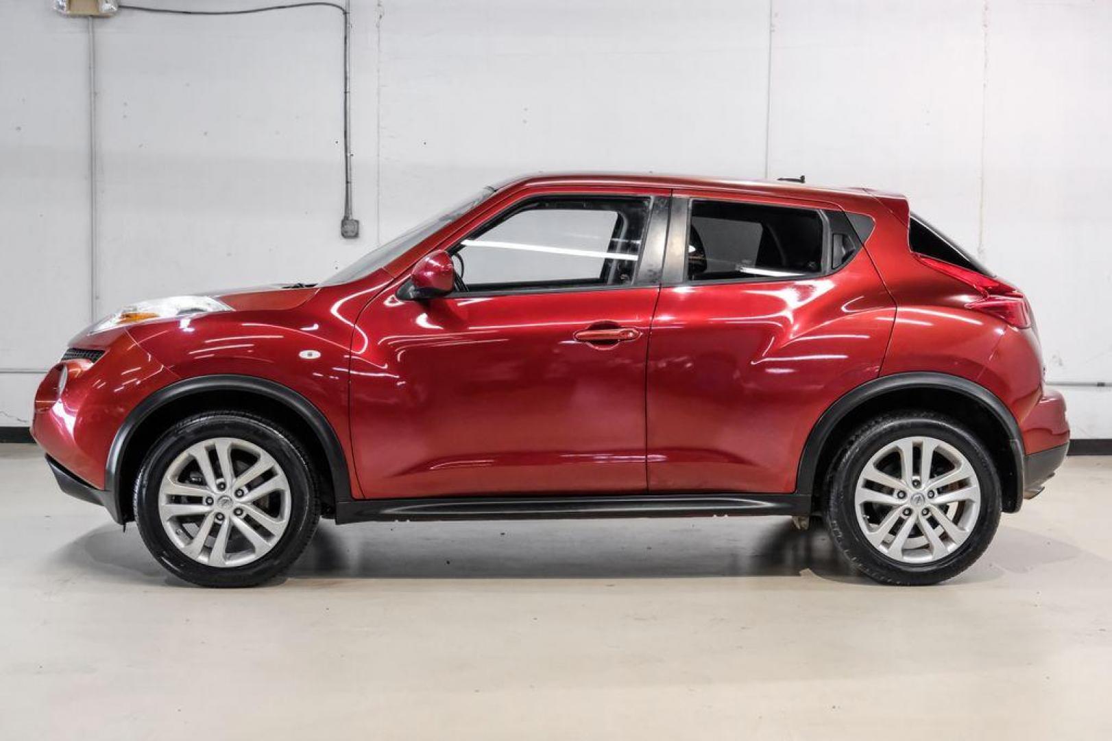 2013 Cayenne Red /Black Nissan Juke SV (JN8AF5MRXDT) with an 1.6L I4 DOHC 16V engine, CVT transmission, located at 15300 Midway Rd., Addison, TX, 75001, (972) 702-0011, 32.958321, -96.838074 - Photo#11