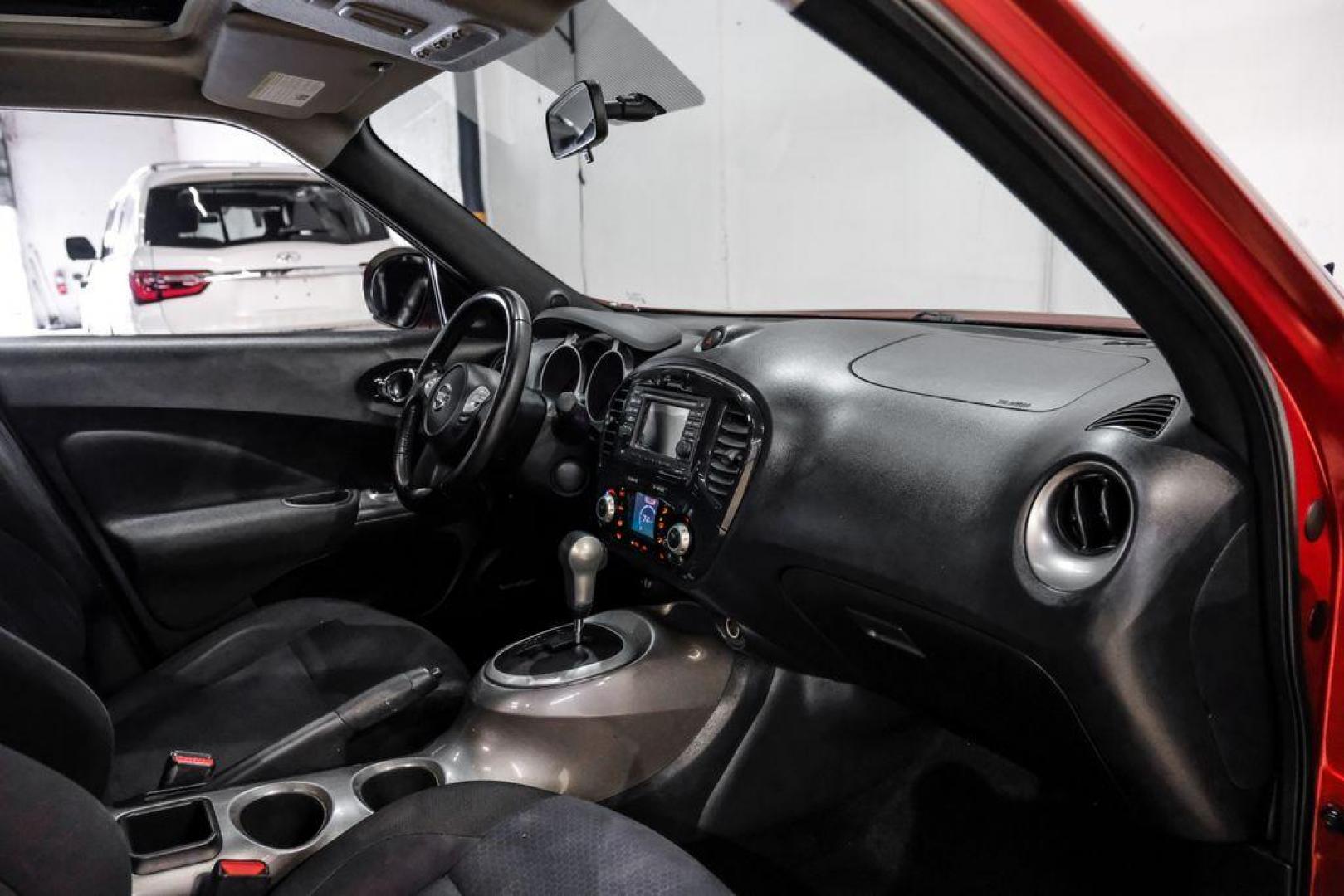 2013 Cayenne Red /Black Nissan Juke SV (JN8AF5MRXDT) with an 1.6L I4 DOHC 16V engine, CVT transmission, located at 15300 Midway Rd., Addison, TX, 75001, (972) 702-0011, 32.958321, -96.838074 - Photo#14