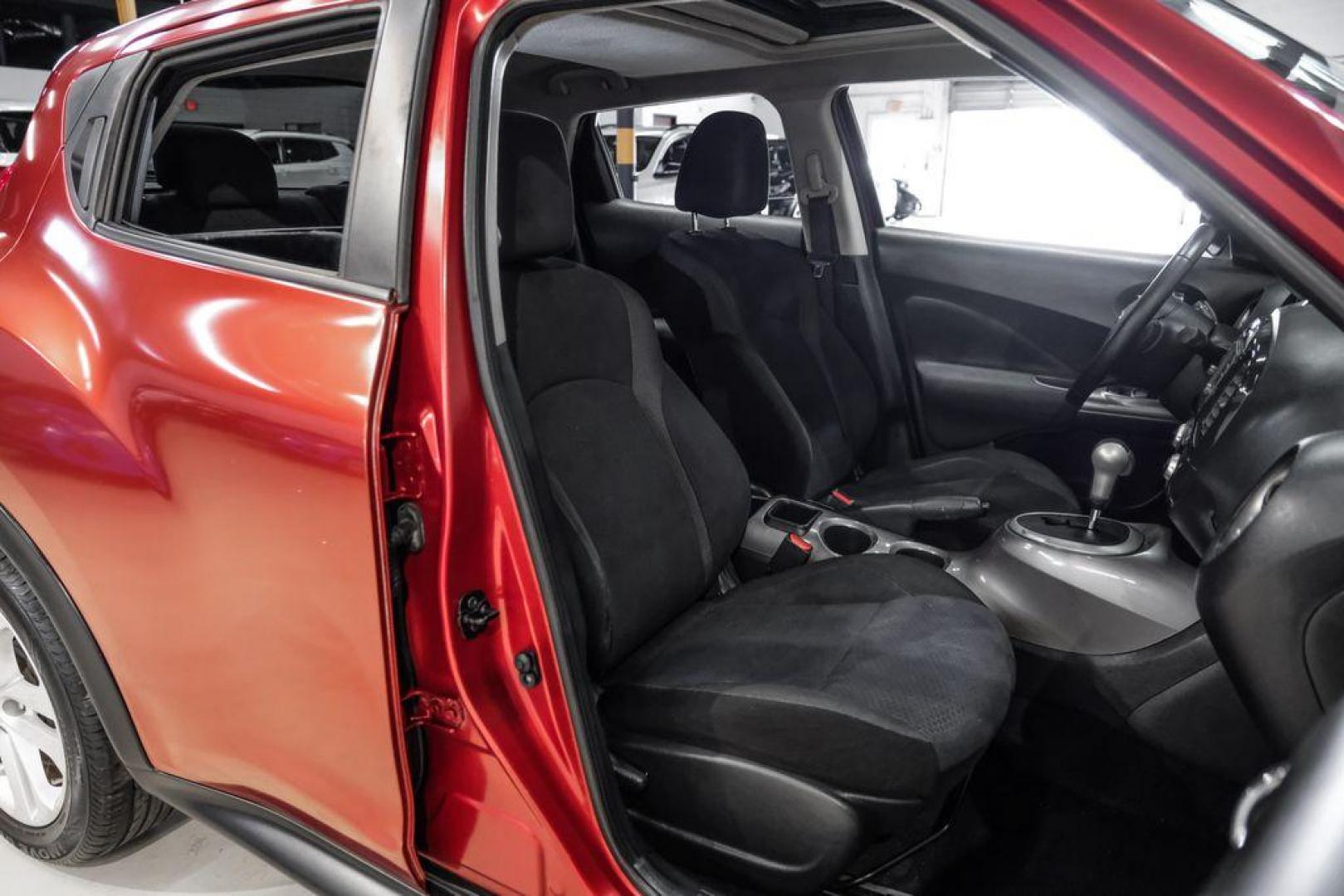 2013 Cayenne Red /Black Nissan Juke SV (JN8AF5MRXDT) with an 1.6L I4 DOHC 16V engine, CVT transmission, located at 15300 Midway Rd., Addison, TX, 75001, (972) 702-0011, 32.958321, -96.838074 - Photo#25