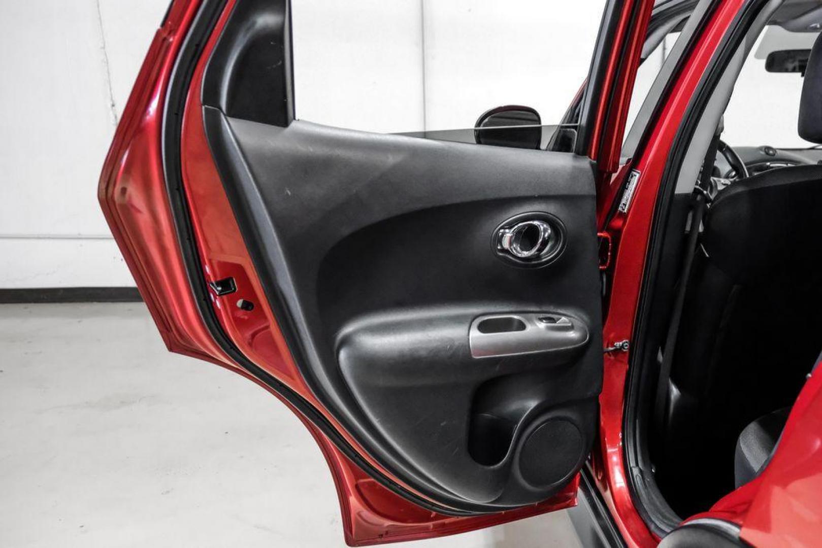 2013 Cayenne Red /Black Nissan Juke SV (JN8AF5MRXDT) with an 1.6L I4 DOHC 16V engine, CVT transmission, located at 15300 Midway Rd., Addison, TX, 75001, (972) 702-0011, 32.958321, -96.838074 - Photo#38