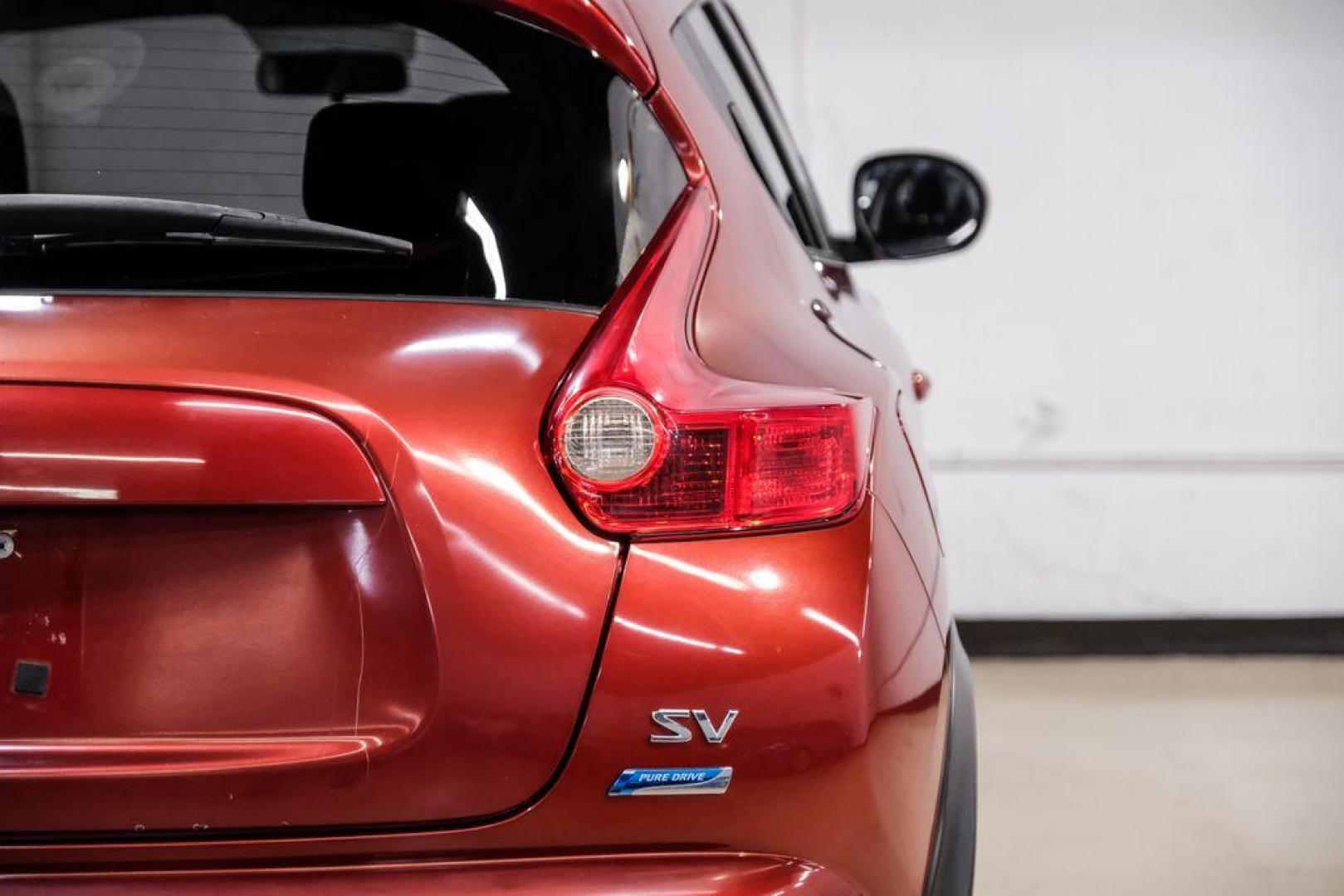 2013 Cayenne Red /Black Nissan Juke SV (JN8AF5MRXDT) with an 1.6L I4 DOHC 16V engine, CVT transmission, located at 15300 Midway Rd., Addison, TX, 75001, (972) 702-0011, 32.958321, -96.838074 - Photo#41
