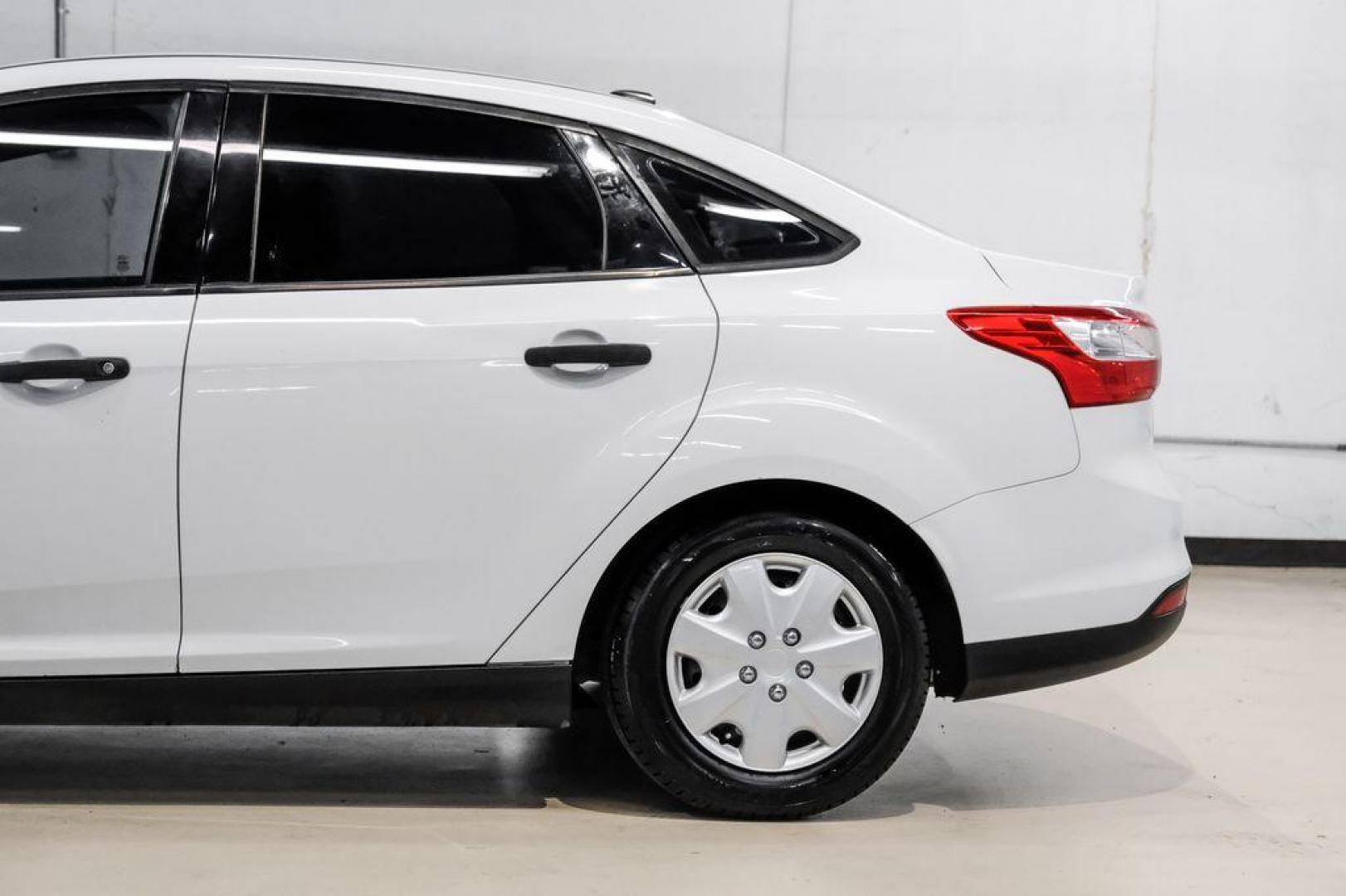 2014 Oxford White /Black Ford Focus S (1FADP3E24EL) with an 2.0L 4-Cylinder DGI Flex Fuel DOHC engine, Automatic transmission, located at 15300 Midway Rd., Addison, TX, 75001, (972) 702-0011, 32.958321, -96.838074 - Photo#12